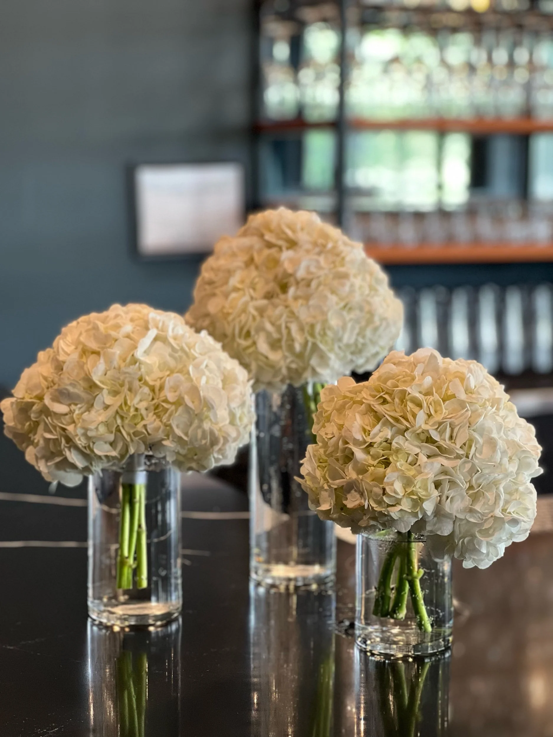 White hydrangea bar arrangements by WS Floral.jpeg