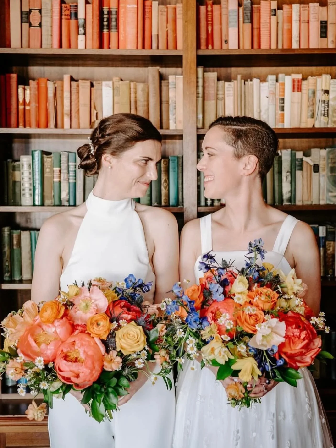 A stunning spring wedding at Felt Estate, Holland, Michigan. So many gorgeous blooms including peonies, poppies, and daffodils. Photography by Liv Lyszyk.