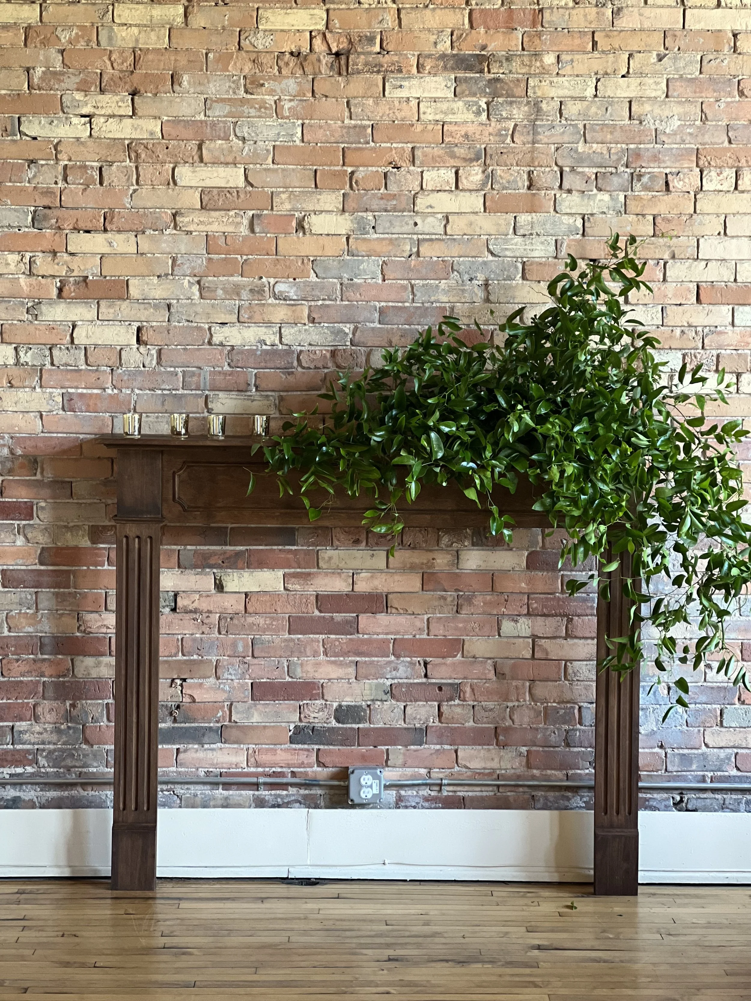 Fireplace Mantel with Greenery Installation by WSFloral.jpg