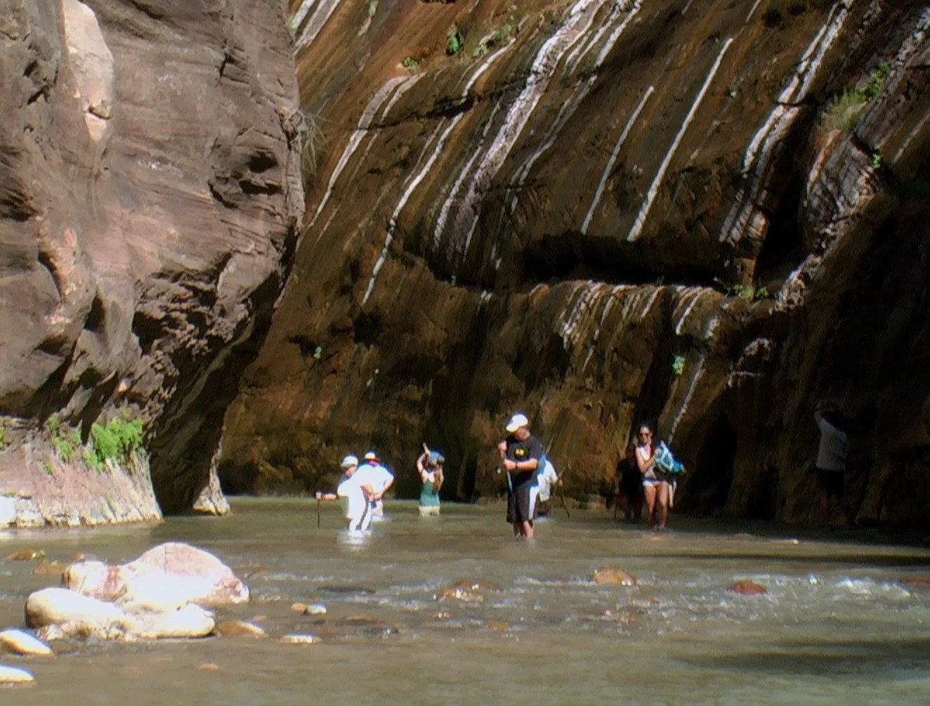  Some folks getting as far as they can into the Narrows 