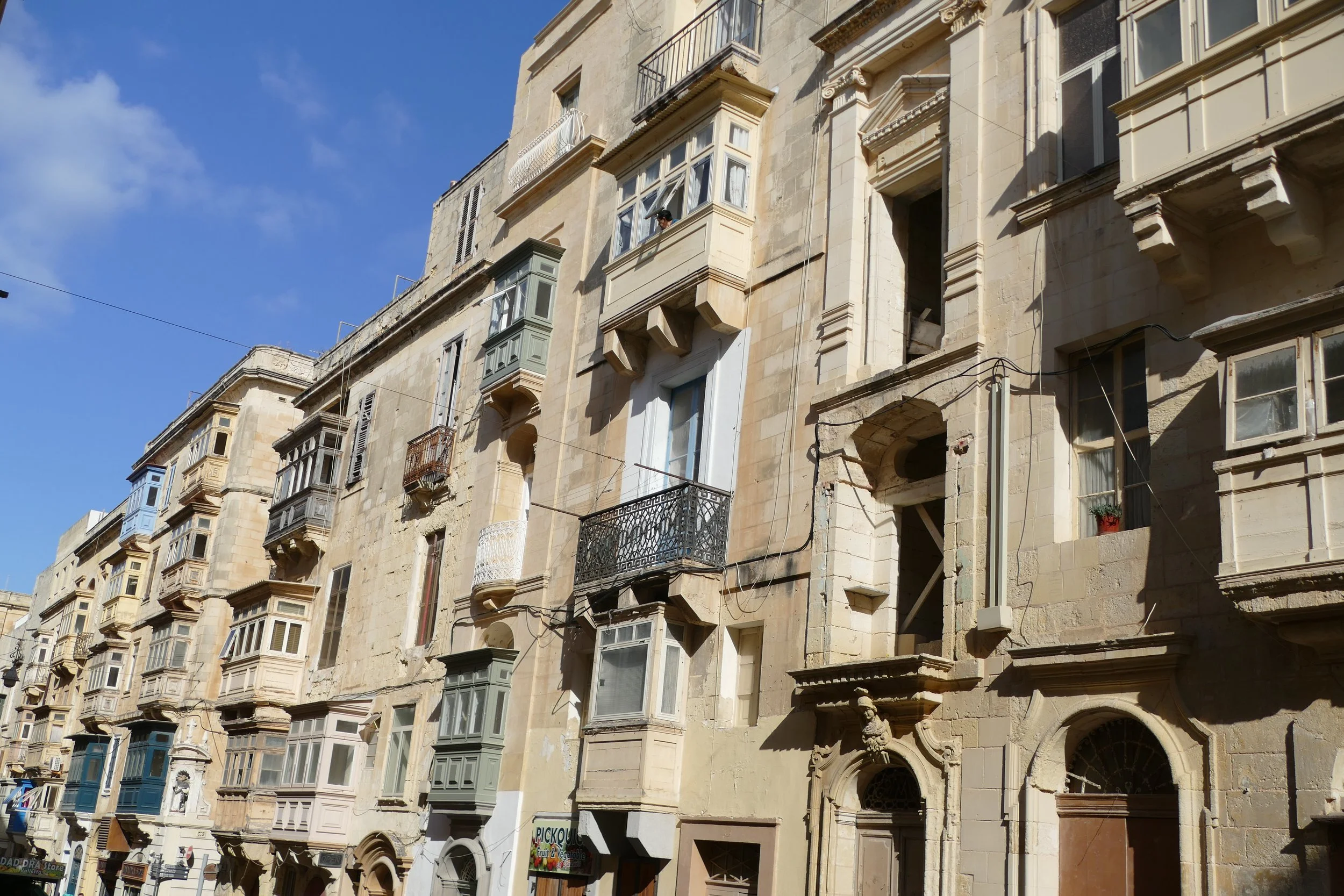 Beautiful enclosed balconies-a design feature here