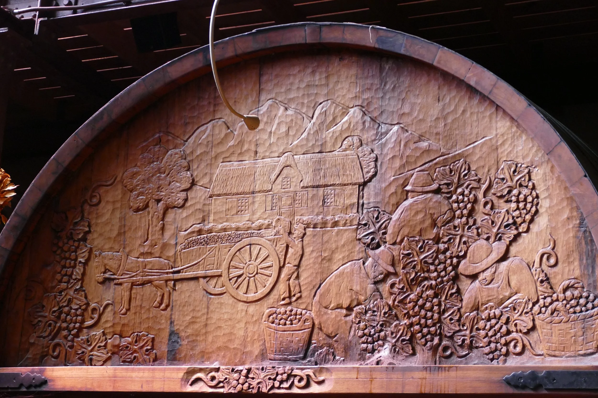   Carvings on wooden cask  