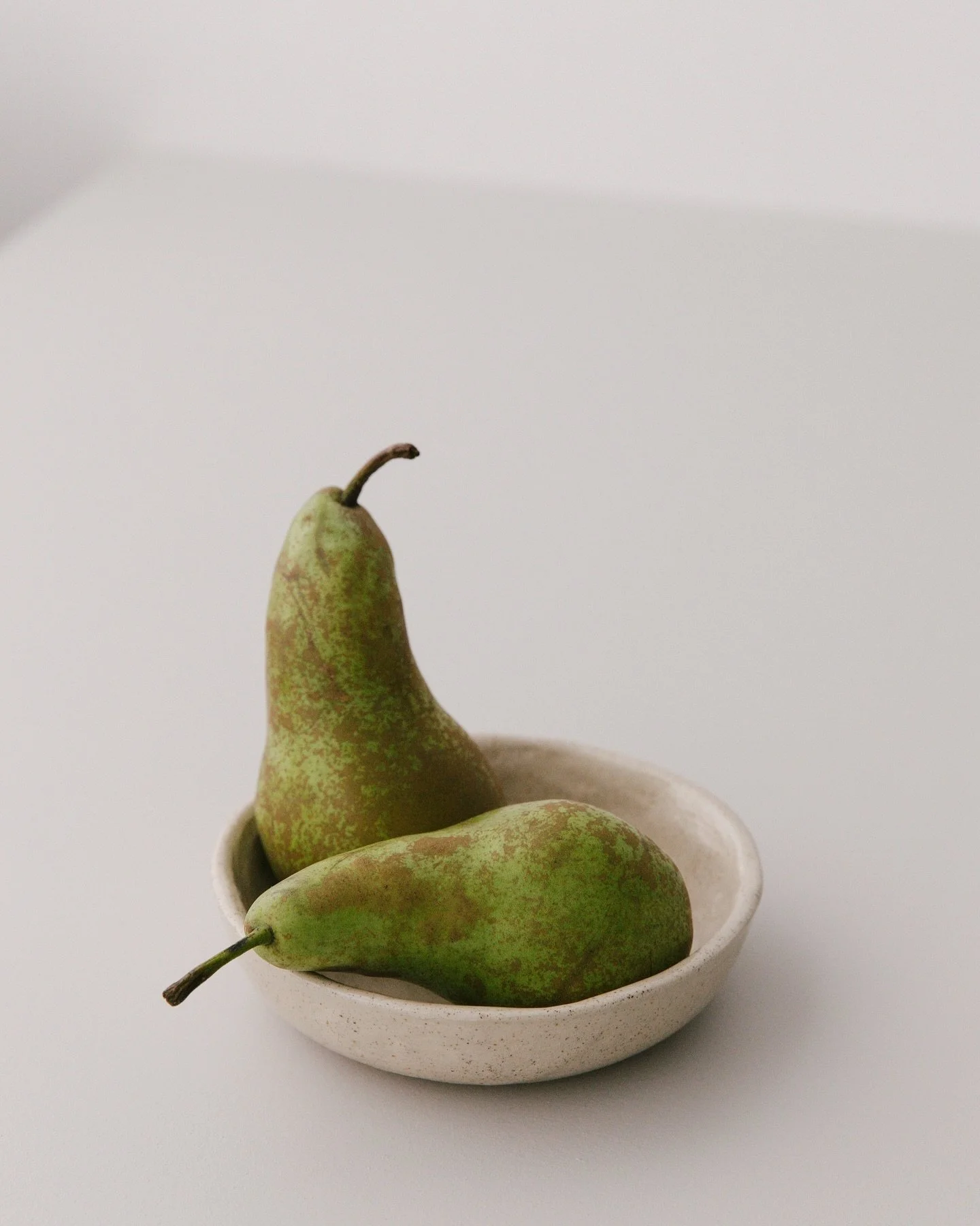 Pears have been featured in my work quite a few times. Their shape and colour, naked and with peel, seem to inspire me.
These two look a little moody to me, maybe because they are a little battered. I feel inclined to polish them until they shine ✨ 
