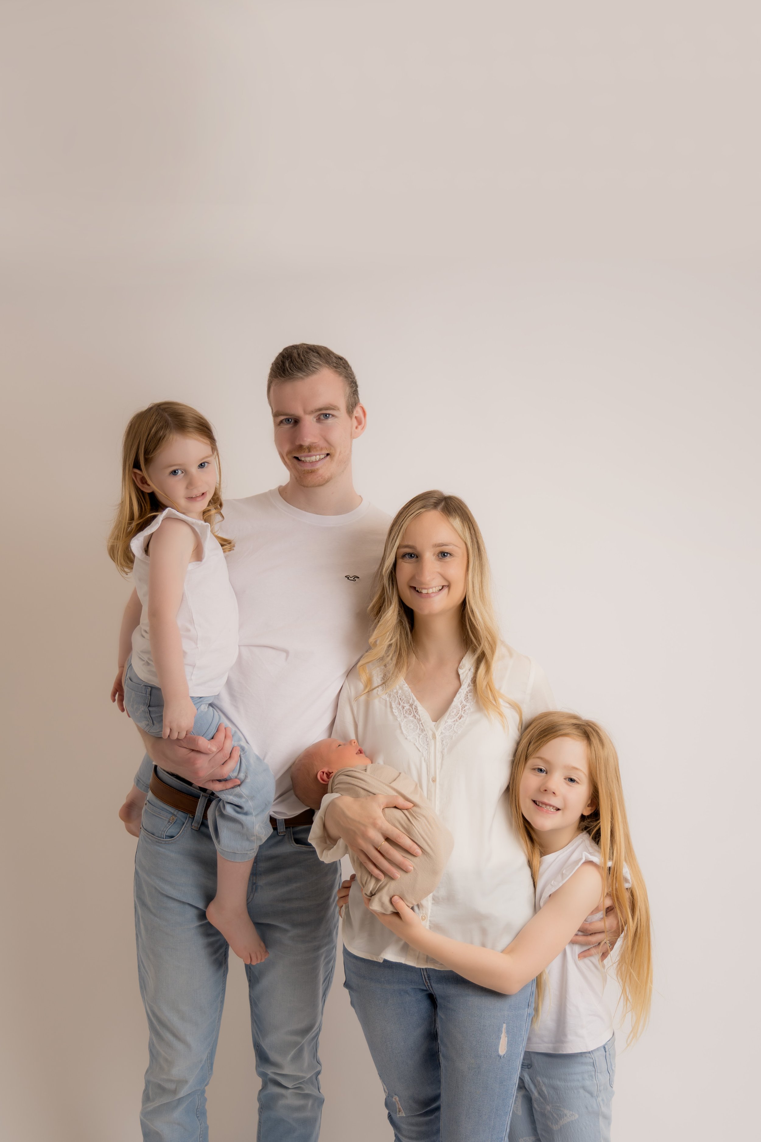 family portrait with newborn cambridgeshire