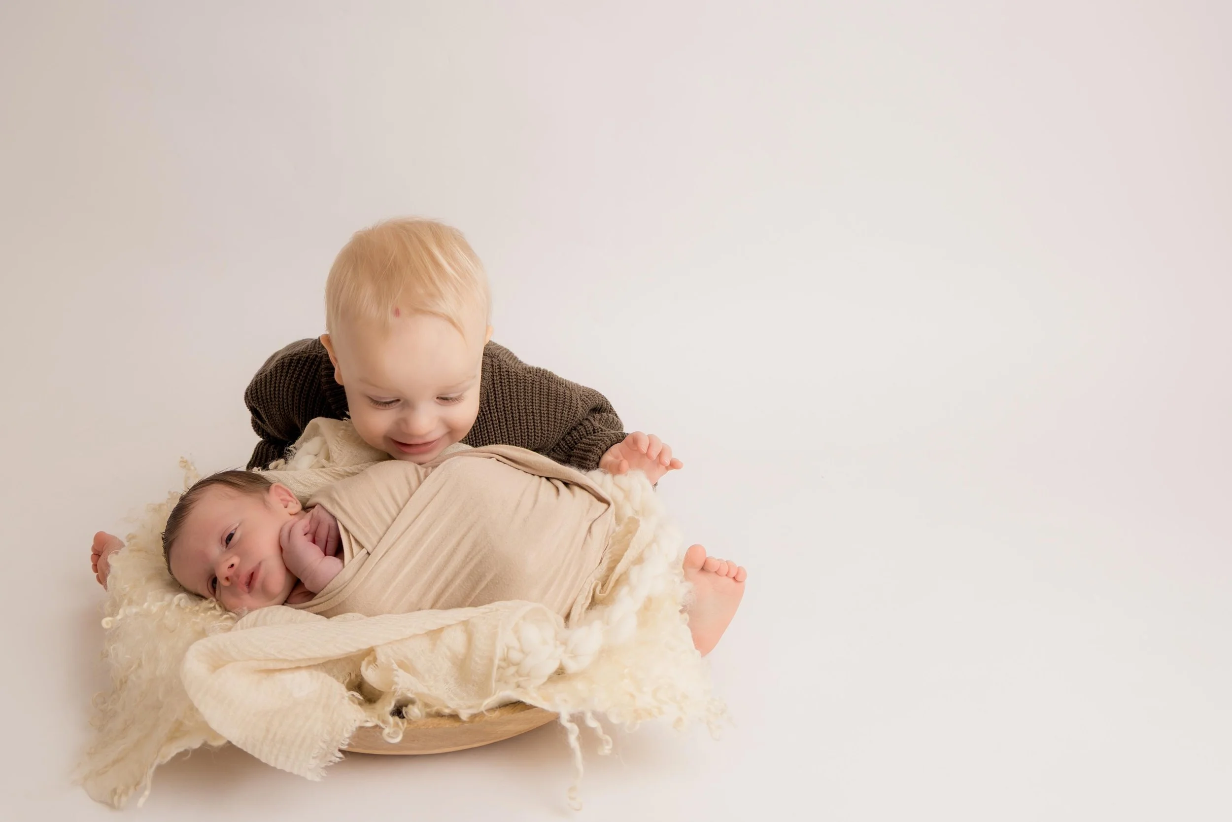 Calm baby-led newborn photography session
