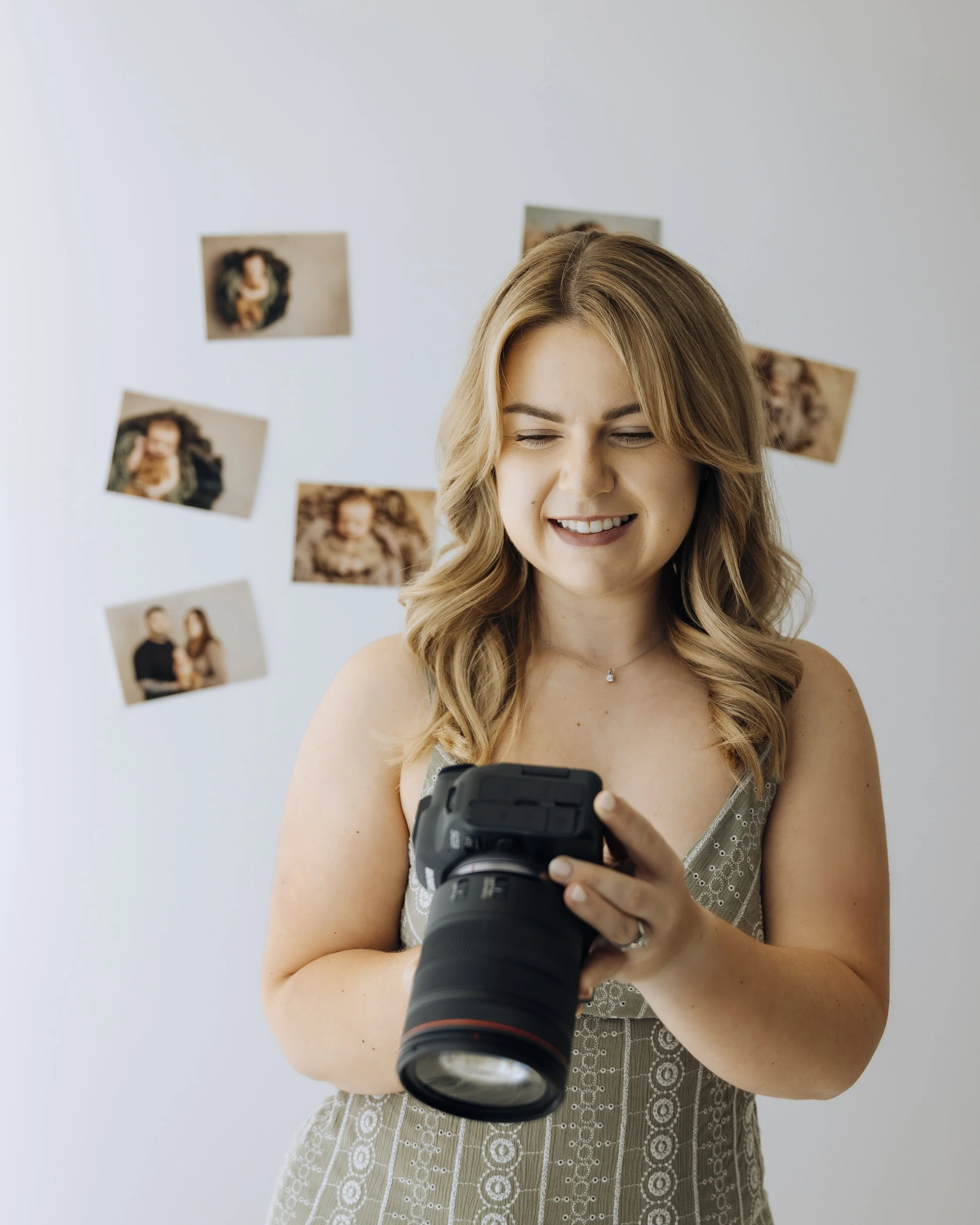 phoebe with her camera in her bedfordshire photography studio