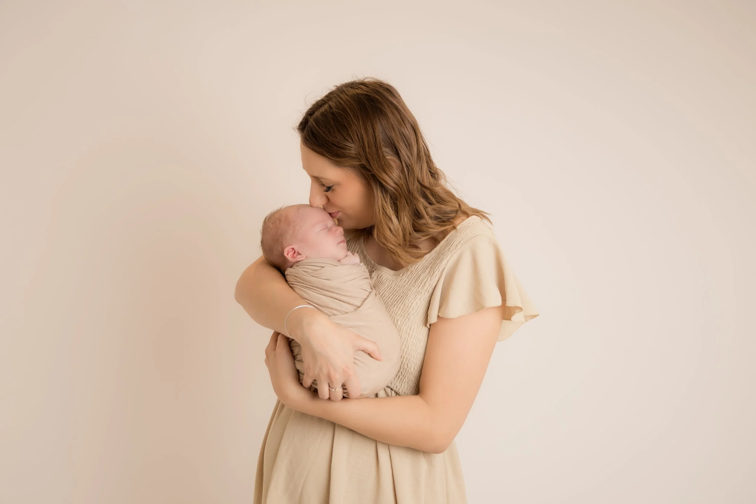 newborn photography baby in mums arms