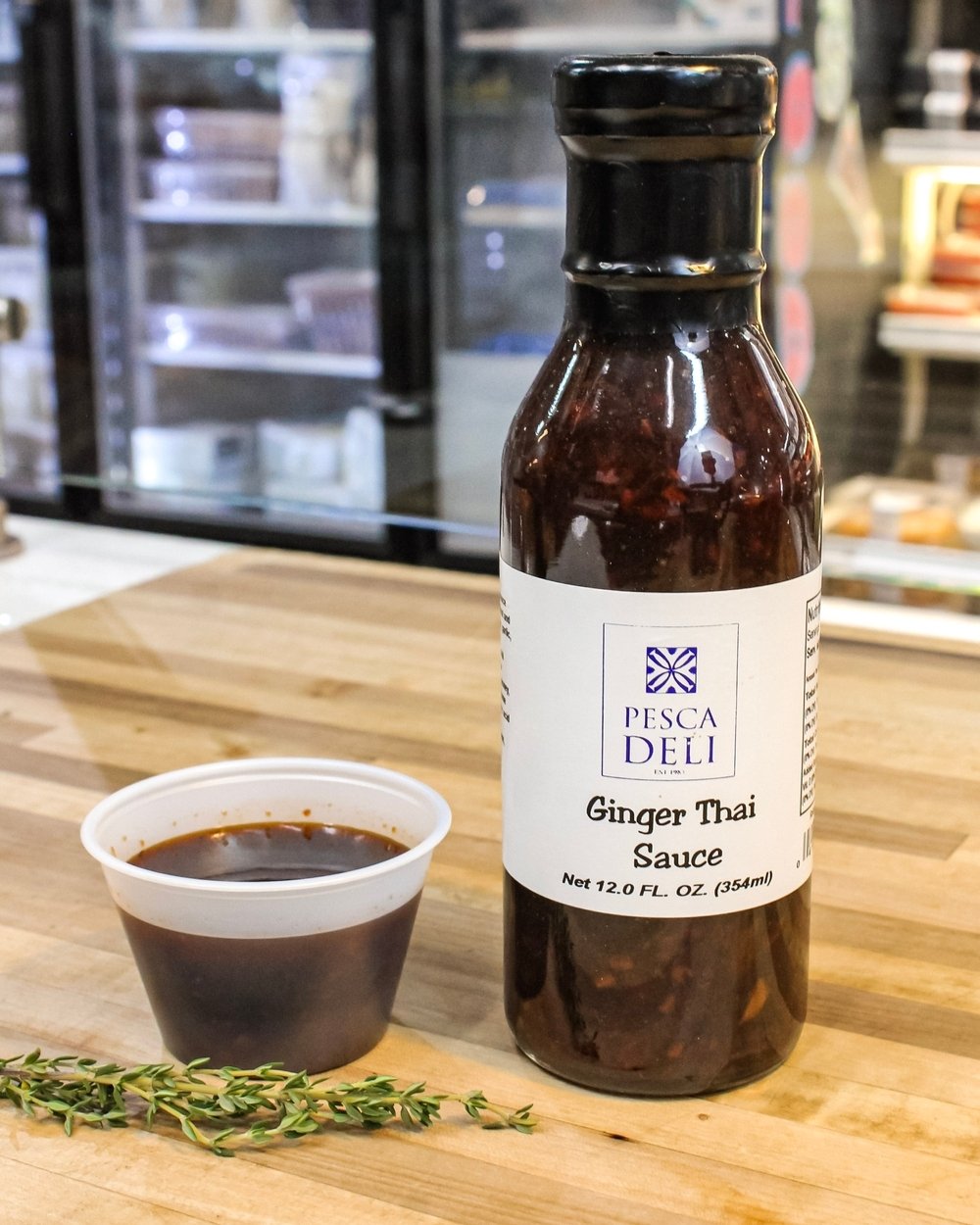 Our house Ginger Thai Sauce pairs perfectly with fresh seafood - from fish to shrimp. Use as a marinade or sauce grilled shrimp with it while they finish cooking. 

#pescadeli #bethesdamd #thaiinspired
