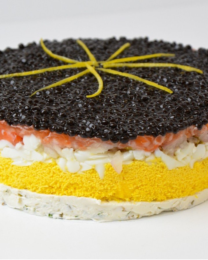 Caviar pie season is here. Layers of mascarpone cheese, chopped egg, salmon tartare and caviar.

Place your order for Thanksgiving now.