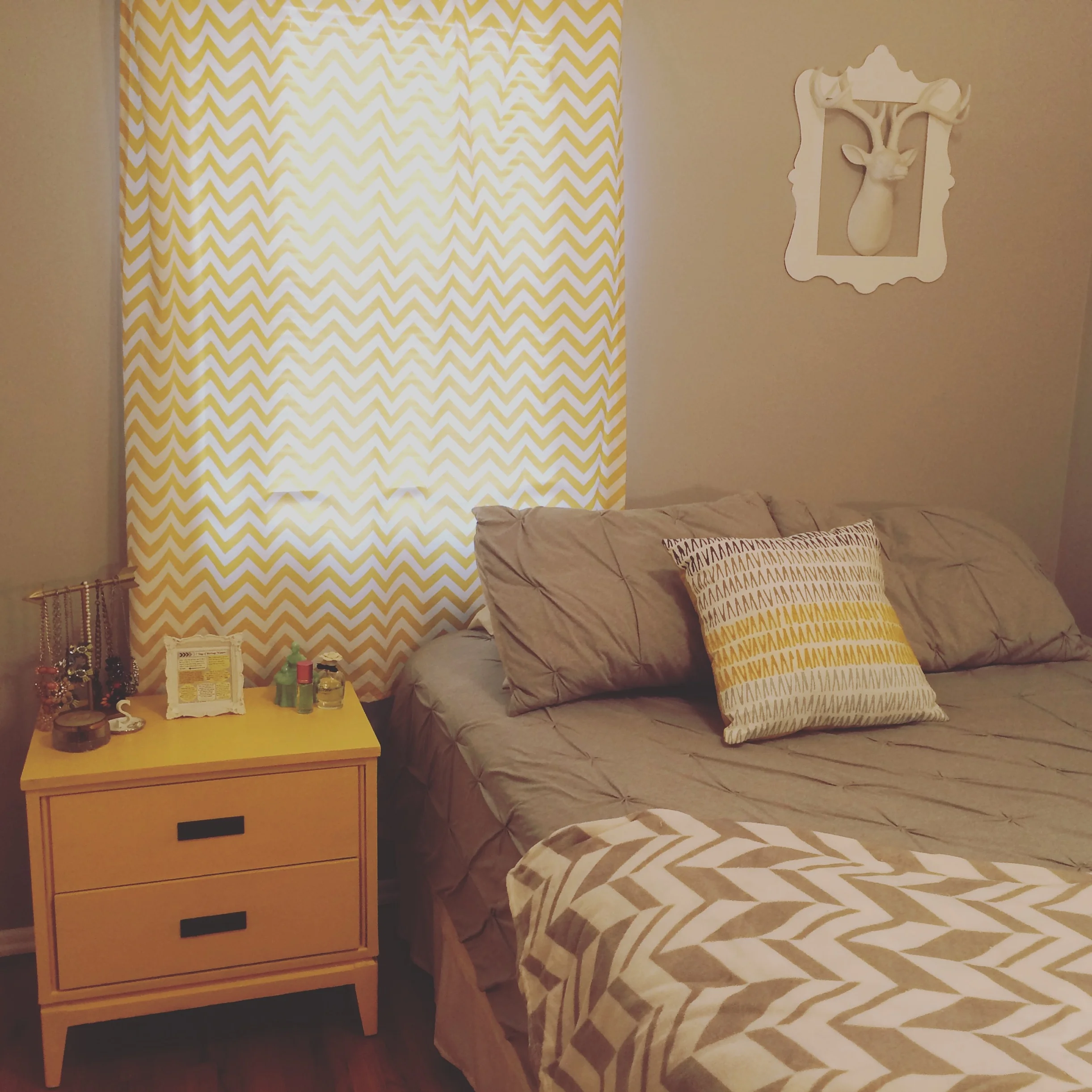 Yellow Accents Make This Bedroom Feel Sunny