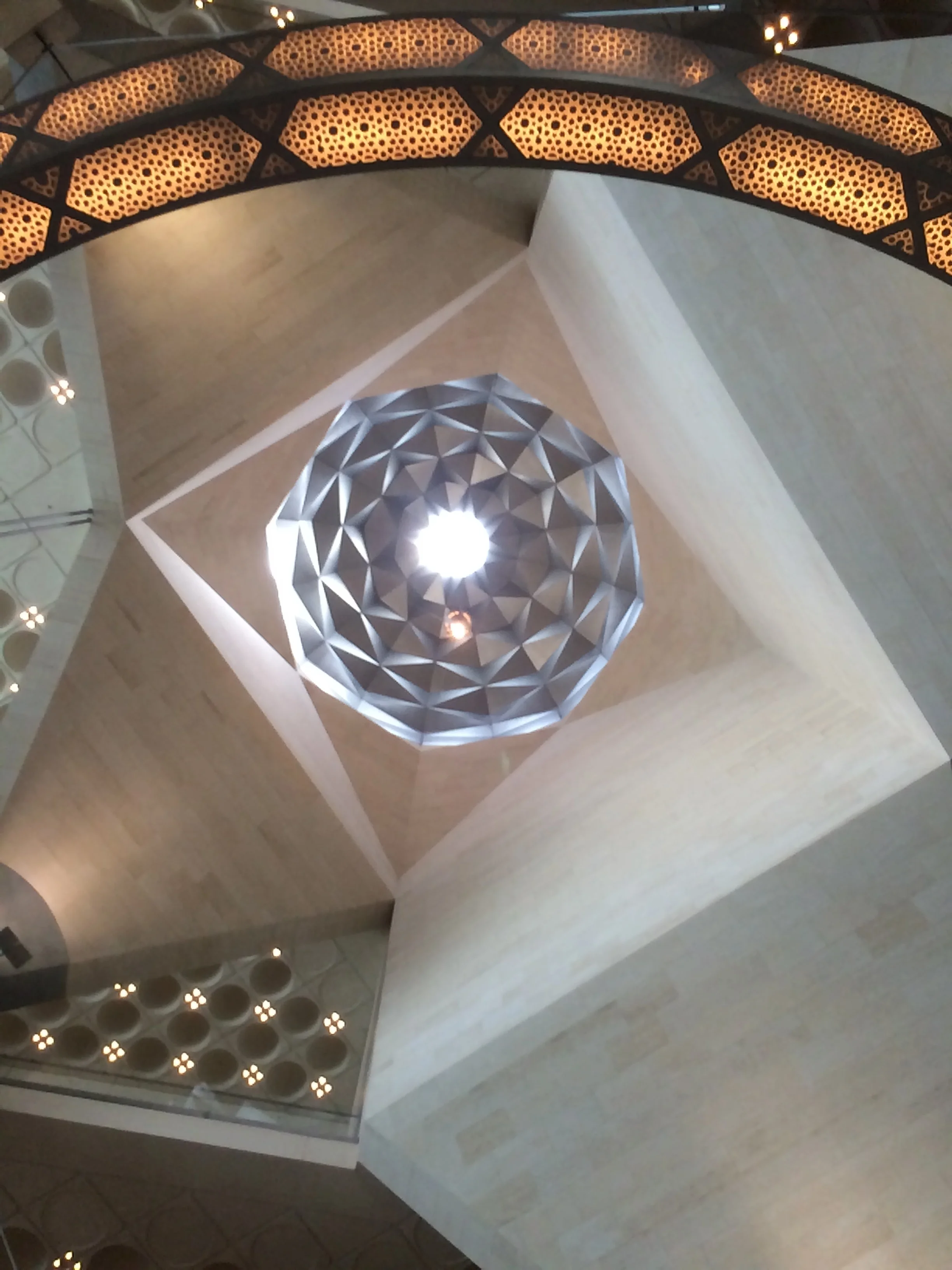 Looking up at the ceiling inside the Museum of Islamic Art.