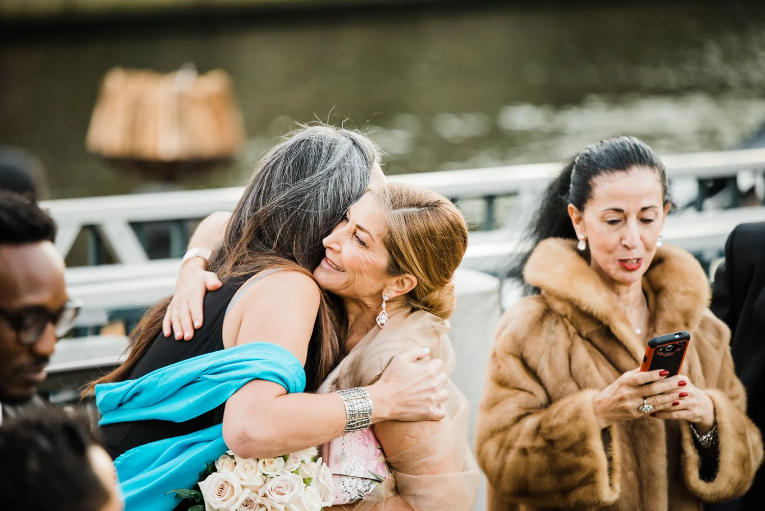 Ephemera Designs Providence, Rhode Island Cafe Nuovo Alternative Wedding Photography Bride Hugs Guest