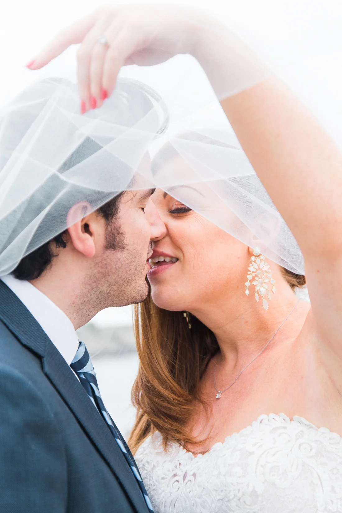 Ephemera Designs Newport, Rhode Island Regatta Place Authentic Wedding Photography Bride & Groom Kiss under Veil