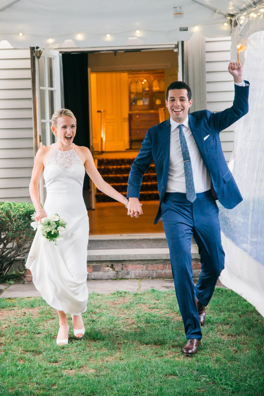 Ephemera Designs Bride & Groom Enter the Reception space Holding Hands