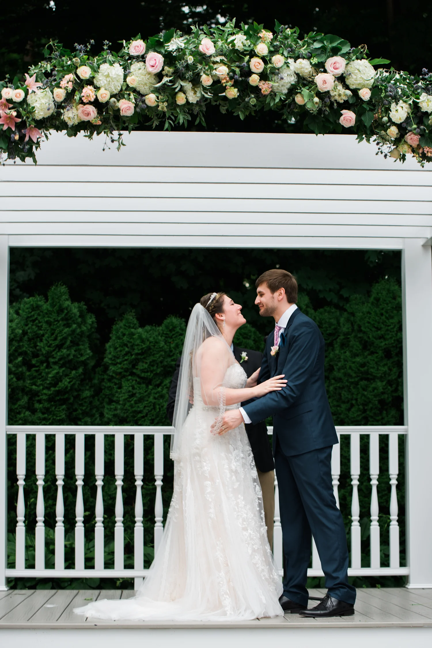 Ephemera Designs Arched Blush & White Flower Arbor with Bride and Groom underneath