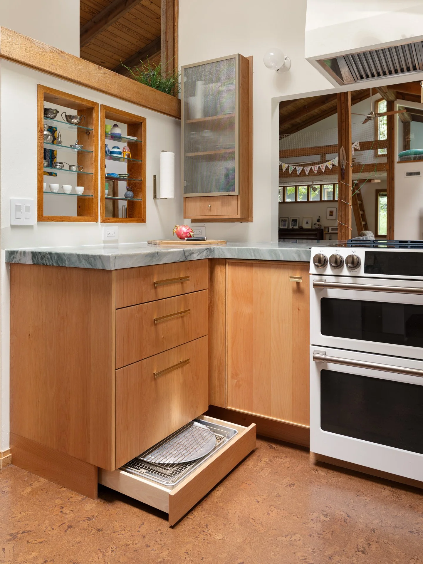 Cabinet with concealed toe-kick drawer