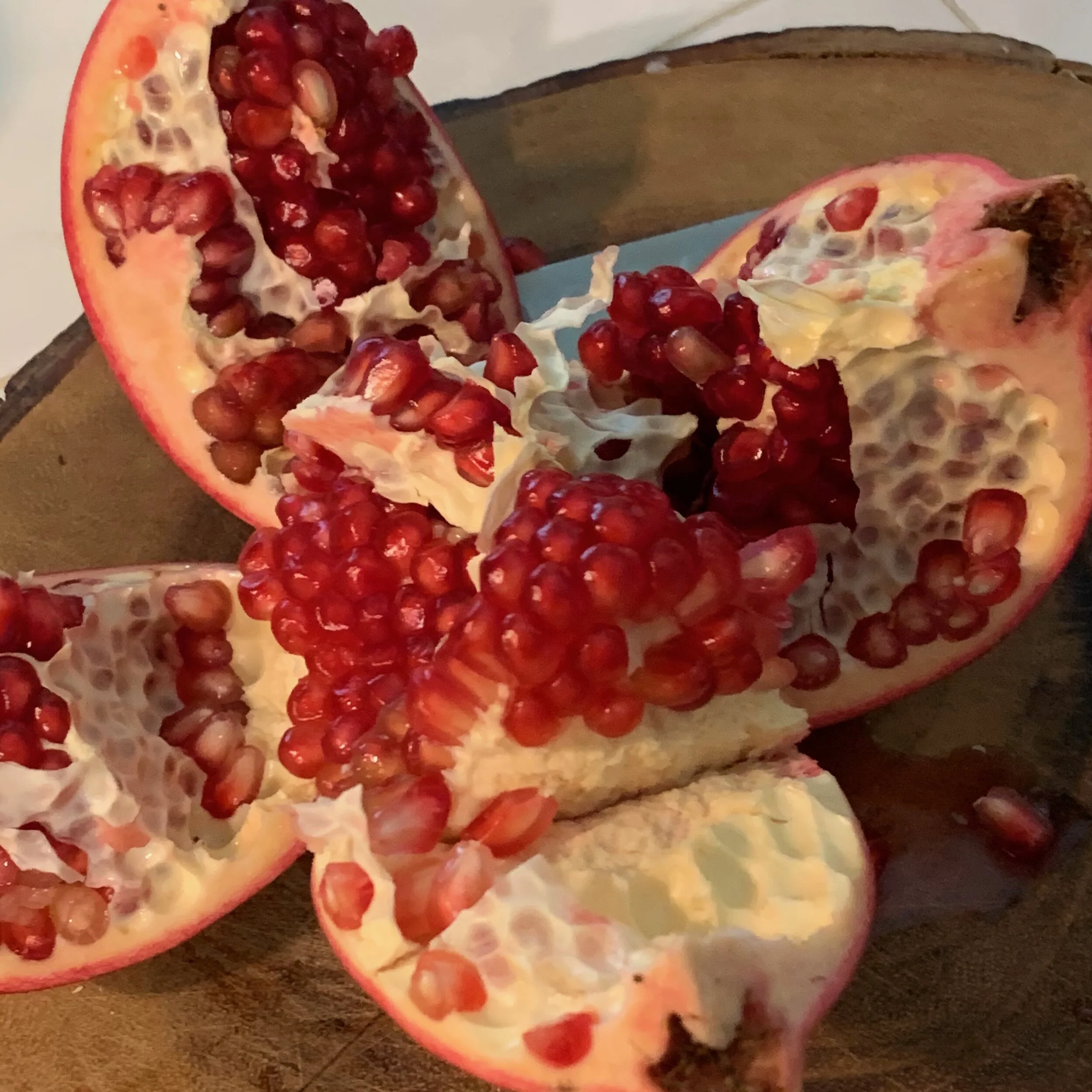 split open and pick the juicy seeds out