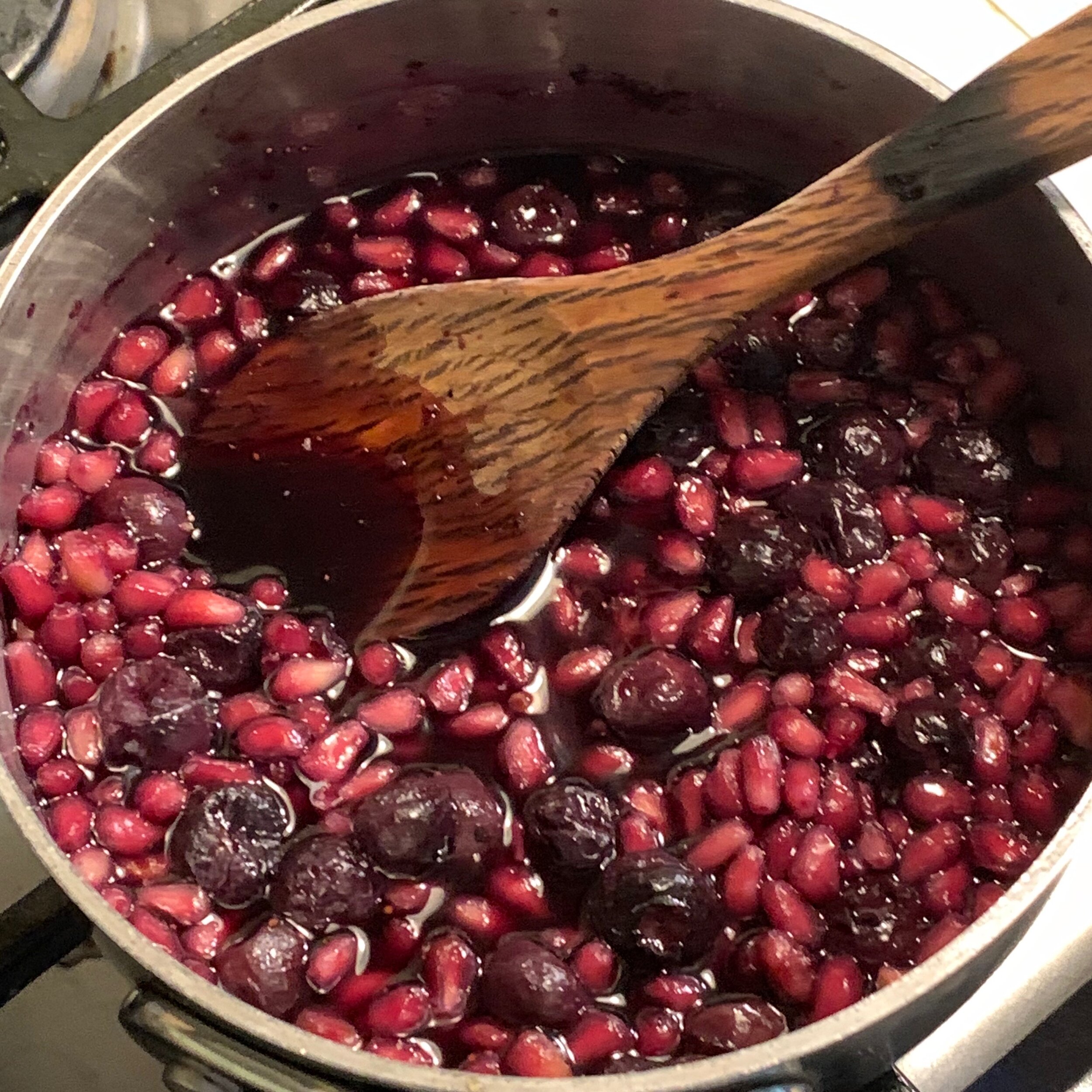 add a cup full of blueberries, maples syrup to taste and heat gently