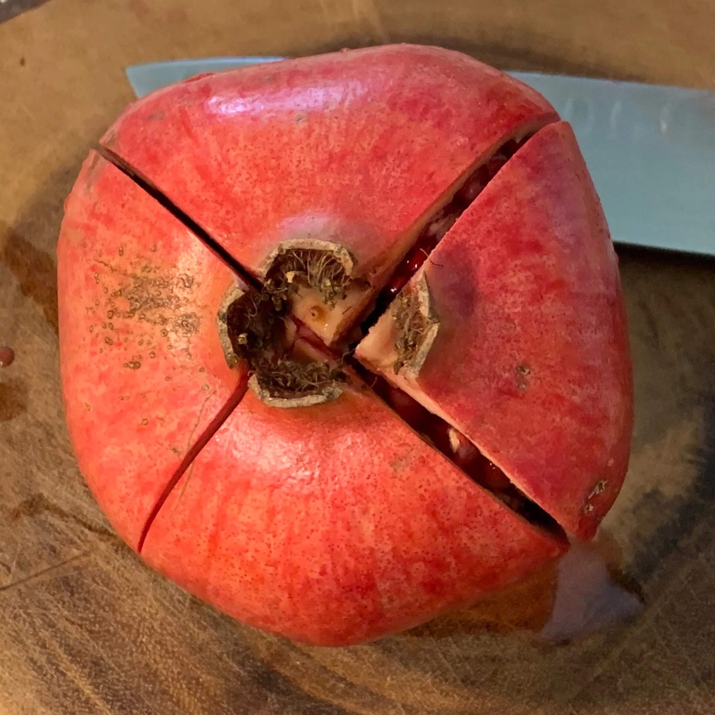 cut the butter skin of the pomegranate
