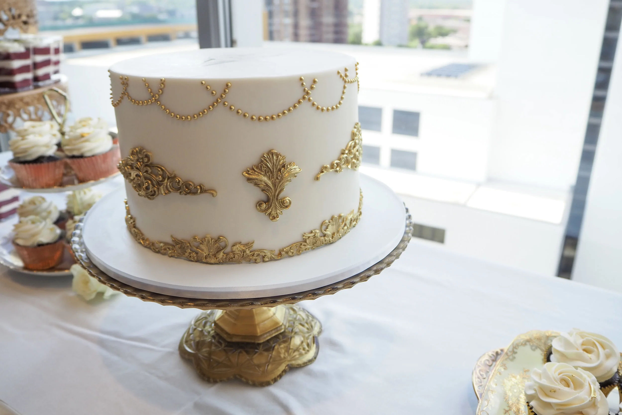 Gorgeous lux gold baroque wedding cake design for an elegant event!