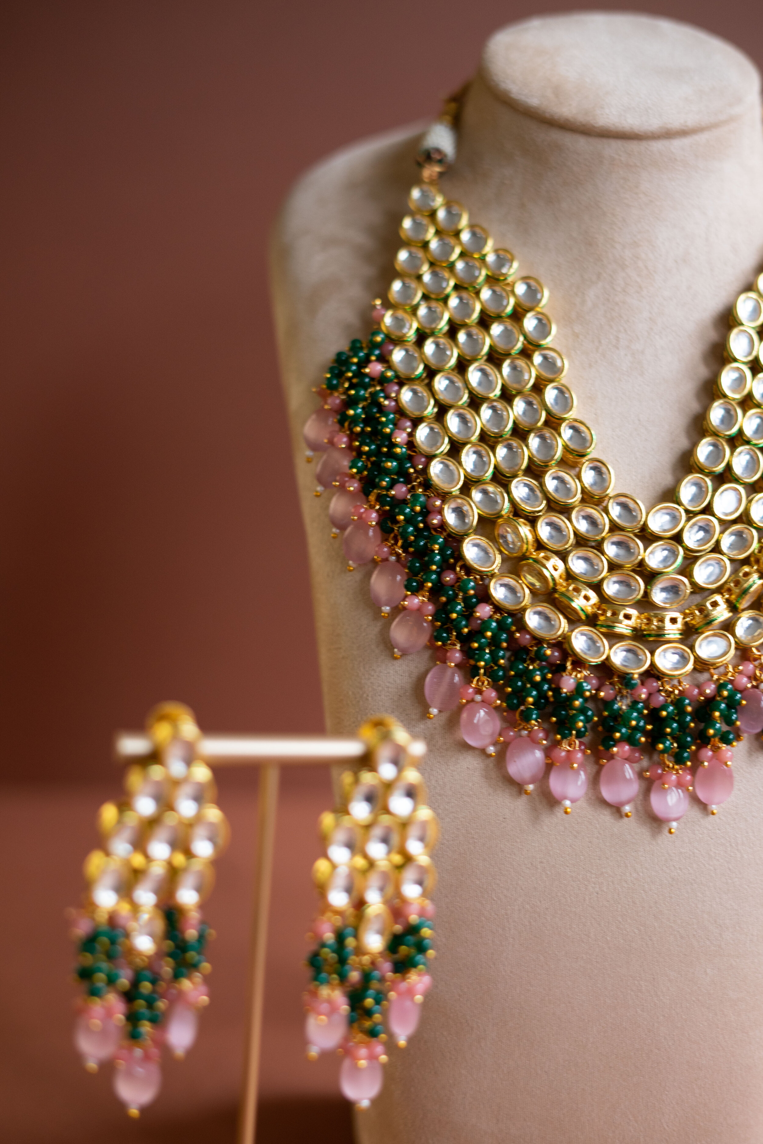 Buy a Maroon Green Kundan Necklace Set On Rutbaa