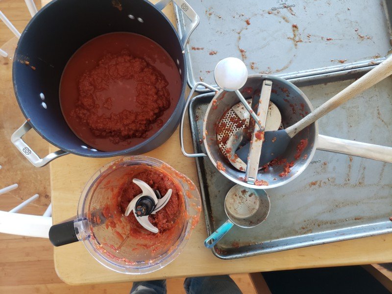 4. Halfway through the baking process, blend &amp; mill the tomatoes.