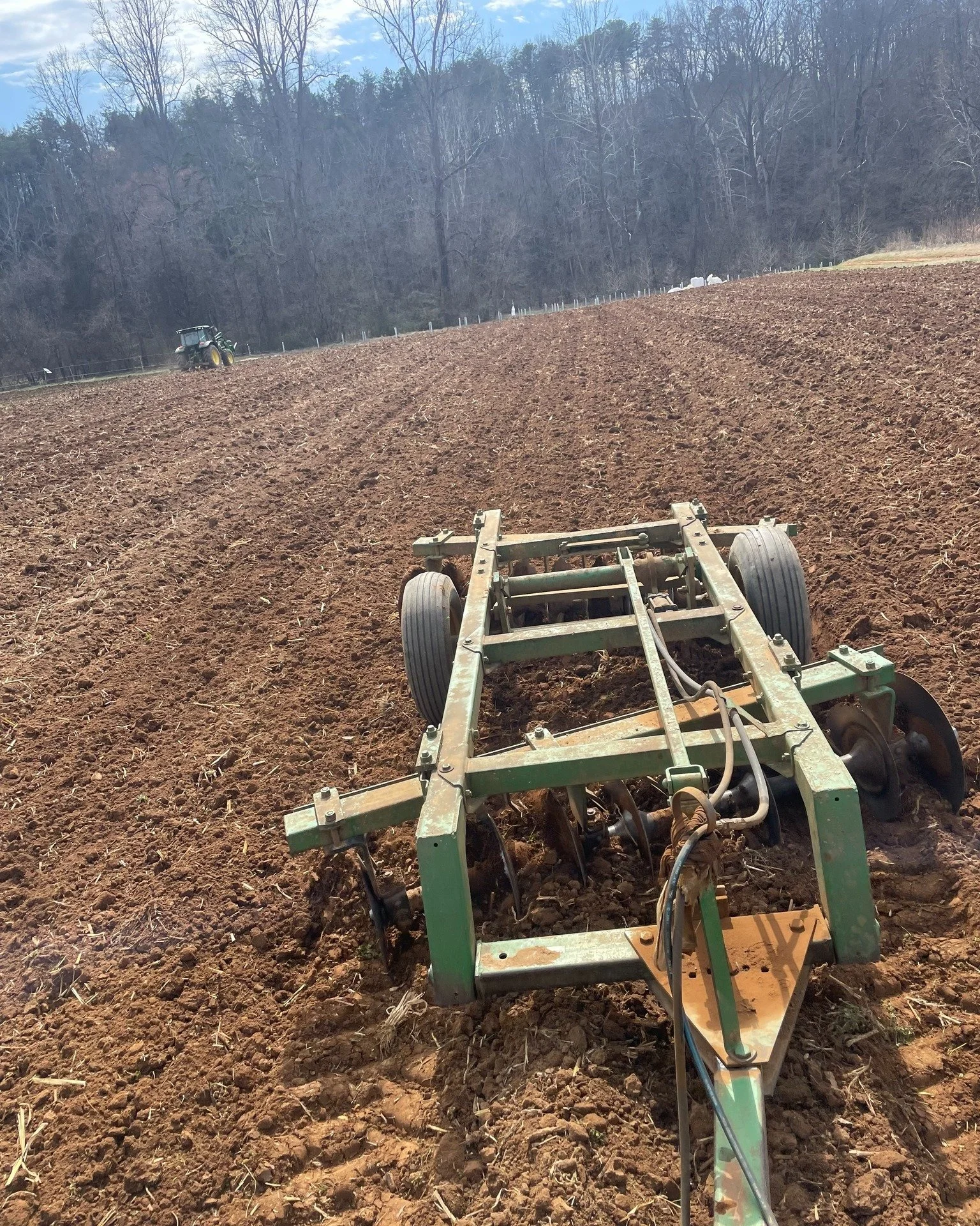 Double tractor action yesterday:

Clayton and Nat worked quickly and get some field prep done before the rain (and snow?!) today. It's time to plant, people! 

This is the start of the 2026 season, and soon these fields will be full of veggies for th