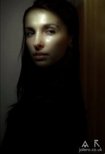 I photographed this particular image entitled Girl with brown hair near Victoria in London, England as part of a series which I will eventually get around to painting in oil on canvas.