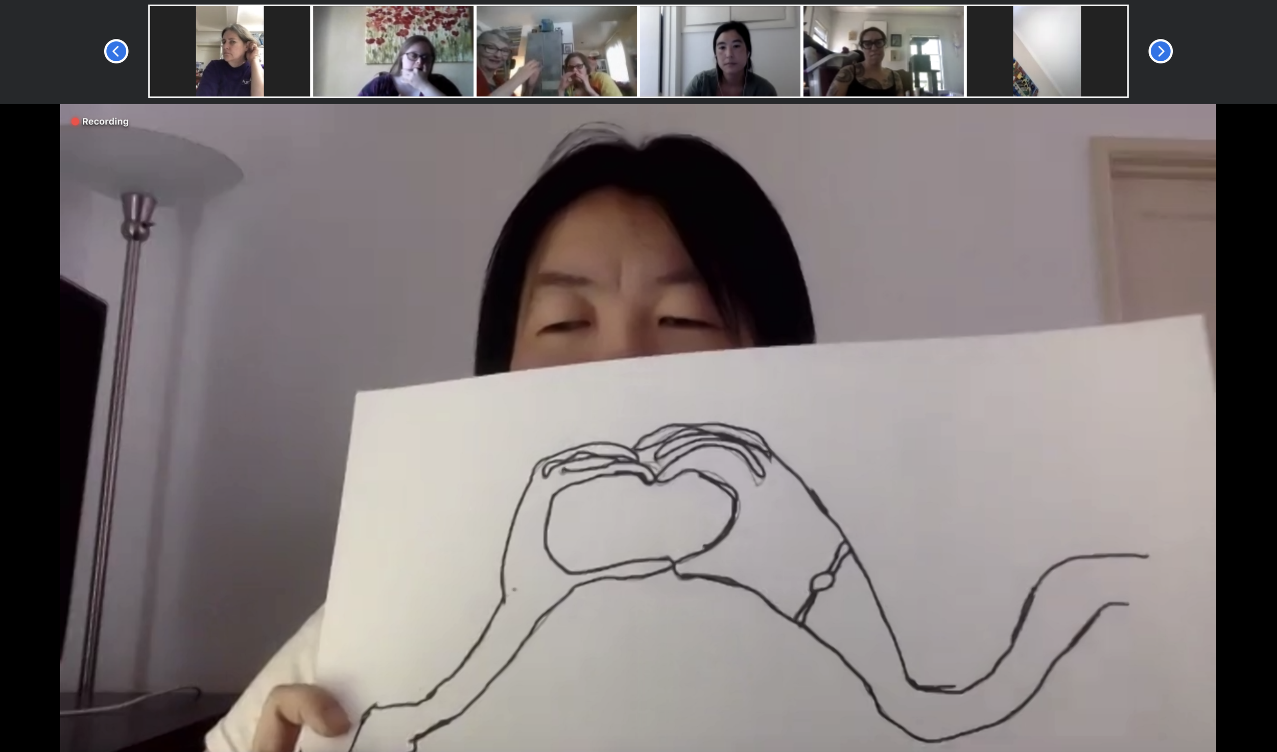 Artist Diana Lo showing a work in progress during an online program on "Vision Boards"