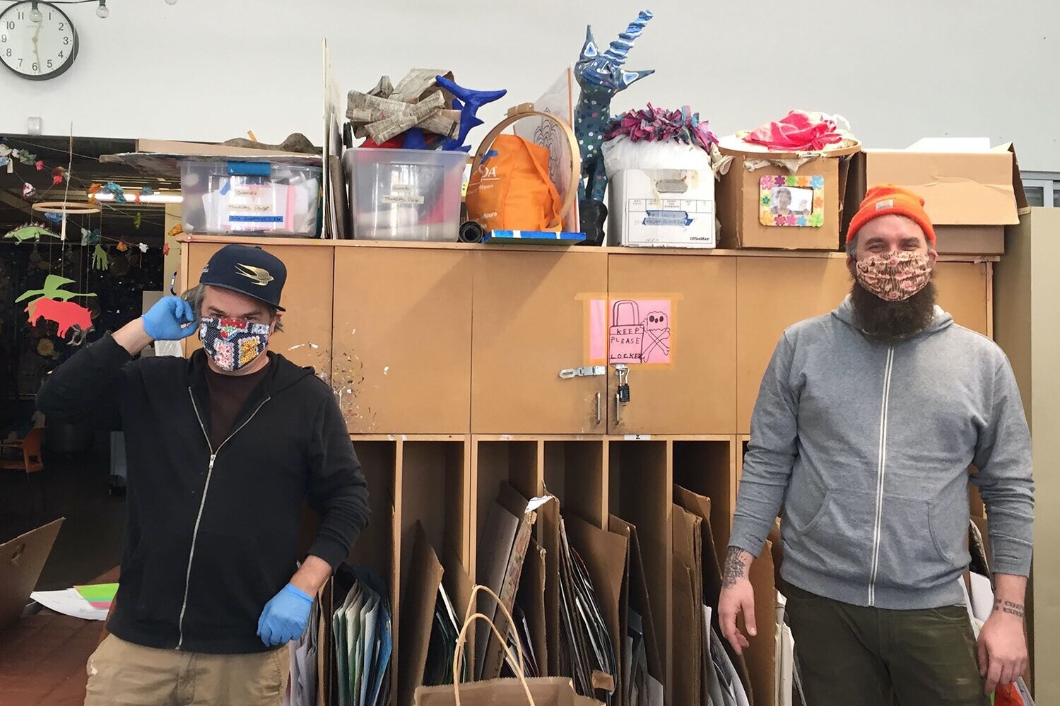 David Wiley, Studio Instructor, and Matt Dostal, Studio Director, packing up art supplies for delivery