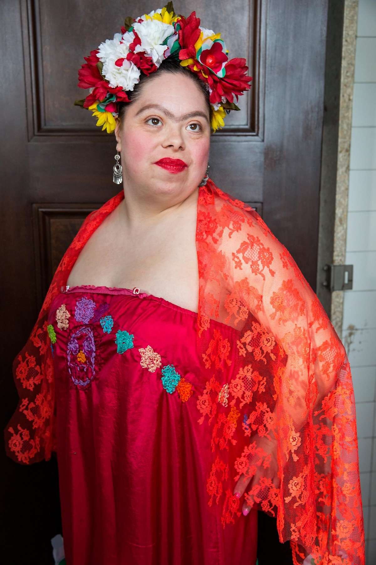 Elizabeth Rangel poses for a portrait wearing her own creation during the 2018 Creative Growth’s Beyond Trend runway show at the Scottish Rite Center in Oakland.
