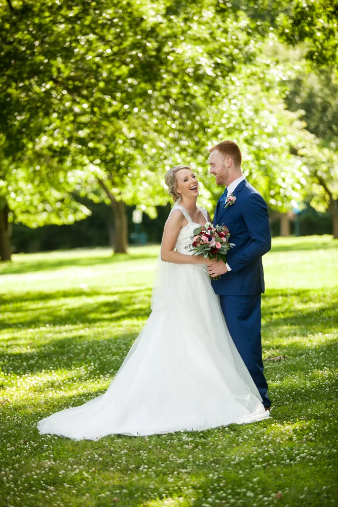 TrotterWeddingPhotoTreesInPark_1000x667.jpg