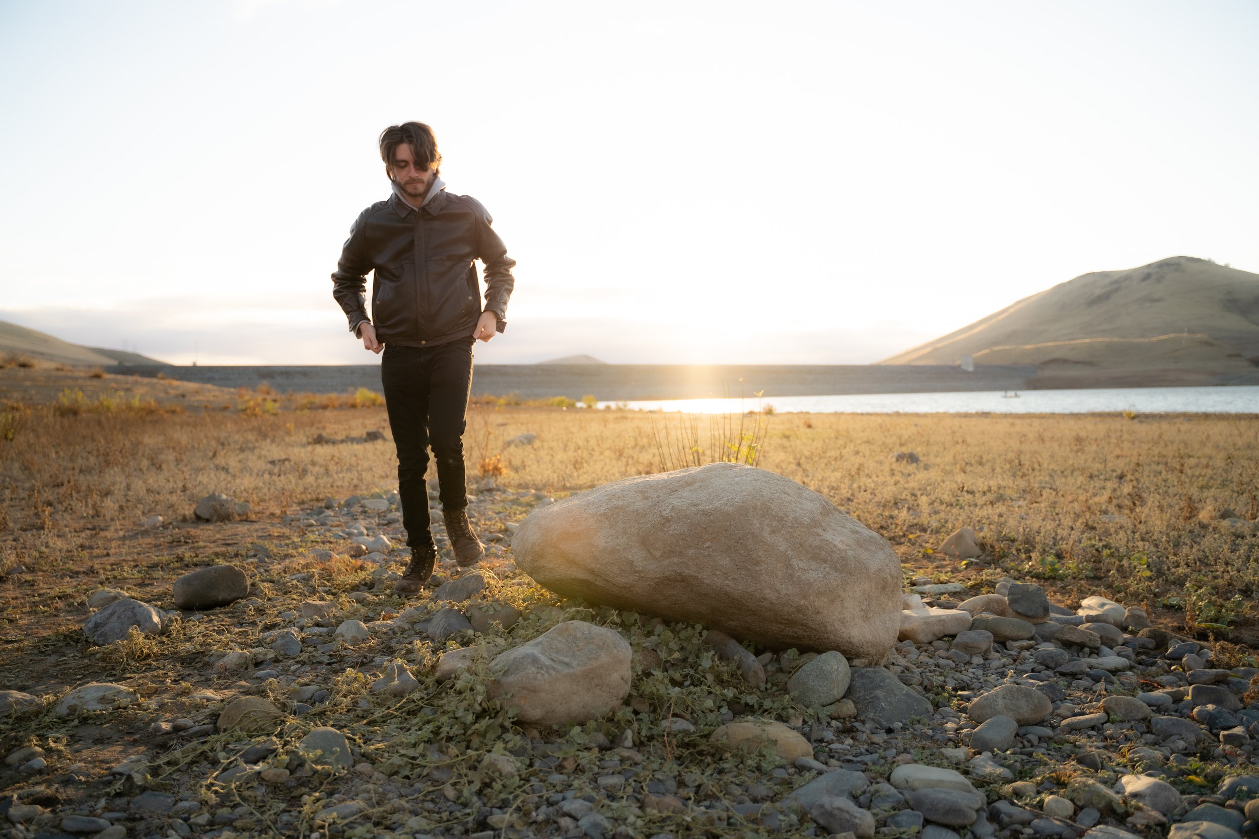Stefan Linhares walks near a lake in California