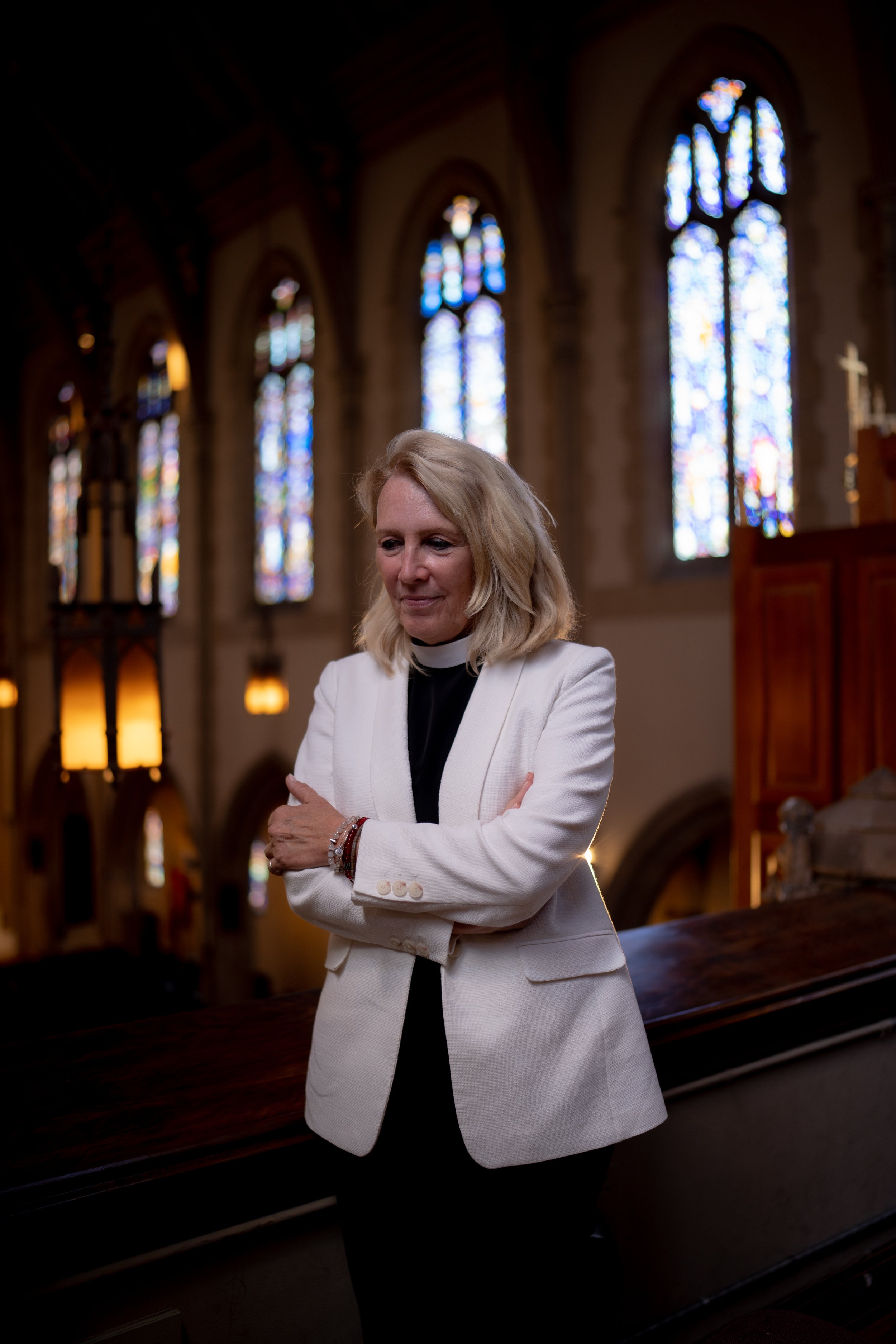 Reverend Kate Cress stands in St James Episcopal Church