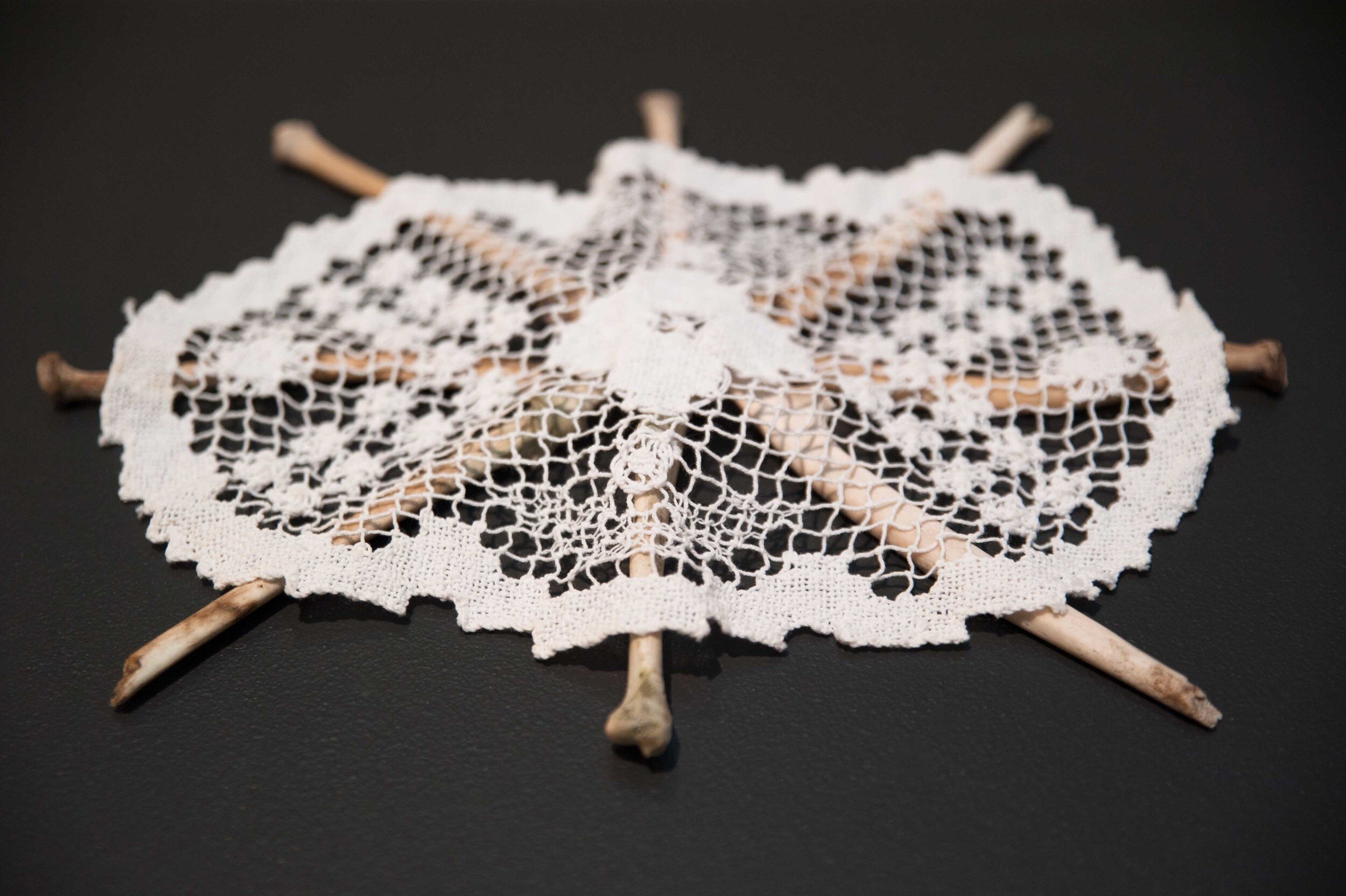 Tamara Baillie,  Dust To Dust , 2015, doilies, bones Courtesy the artist. Photo: Lara Merrington.