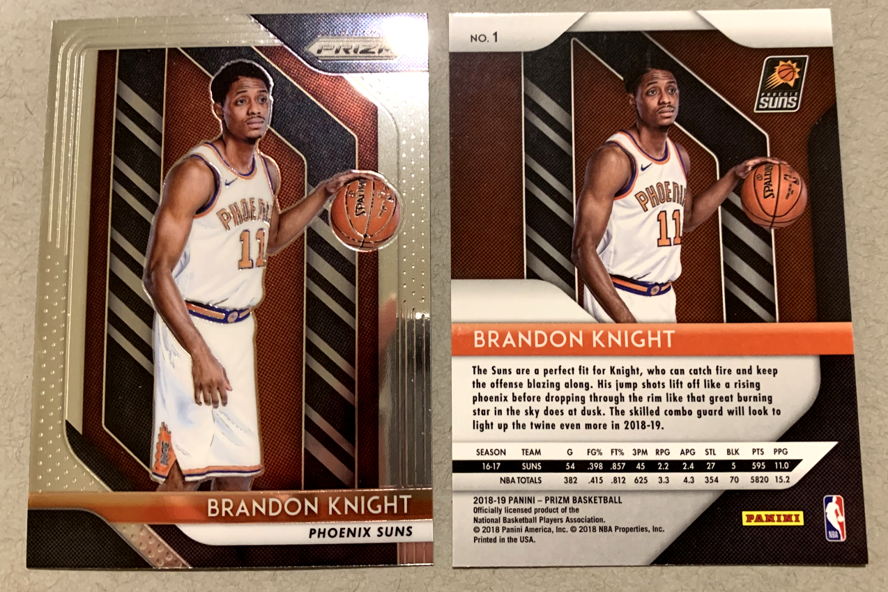 Ladies and gentlemen, I am proud to be able to introduce to you 2018-19 Panini Prizm Basketball card No. 1. It’s none other than Brandon Knight, who hasn’t played in an NBA game since the 2016-17 season. Not that he’s retired or anything. Remember w…
