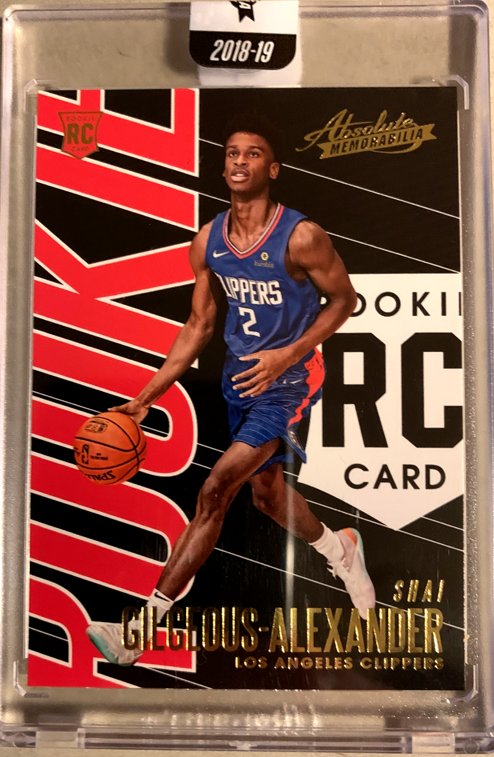 Do you think this is his rookie card? Fortunately, Panini decided to grace this card of SGA doing something resembling a basketball move.