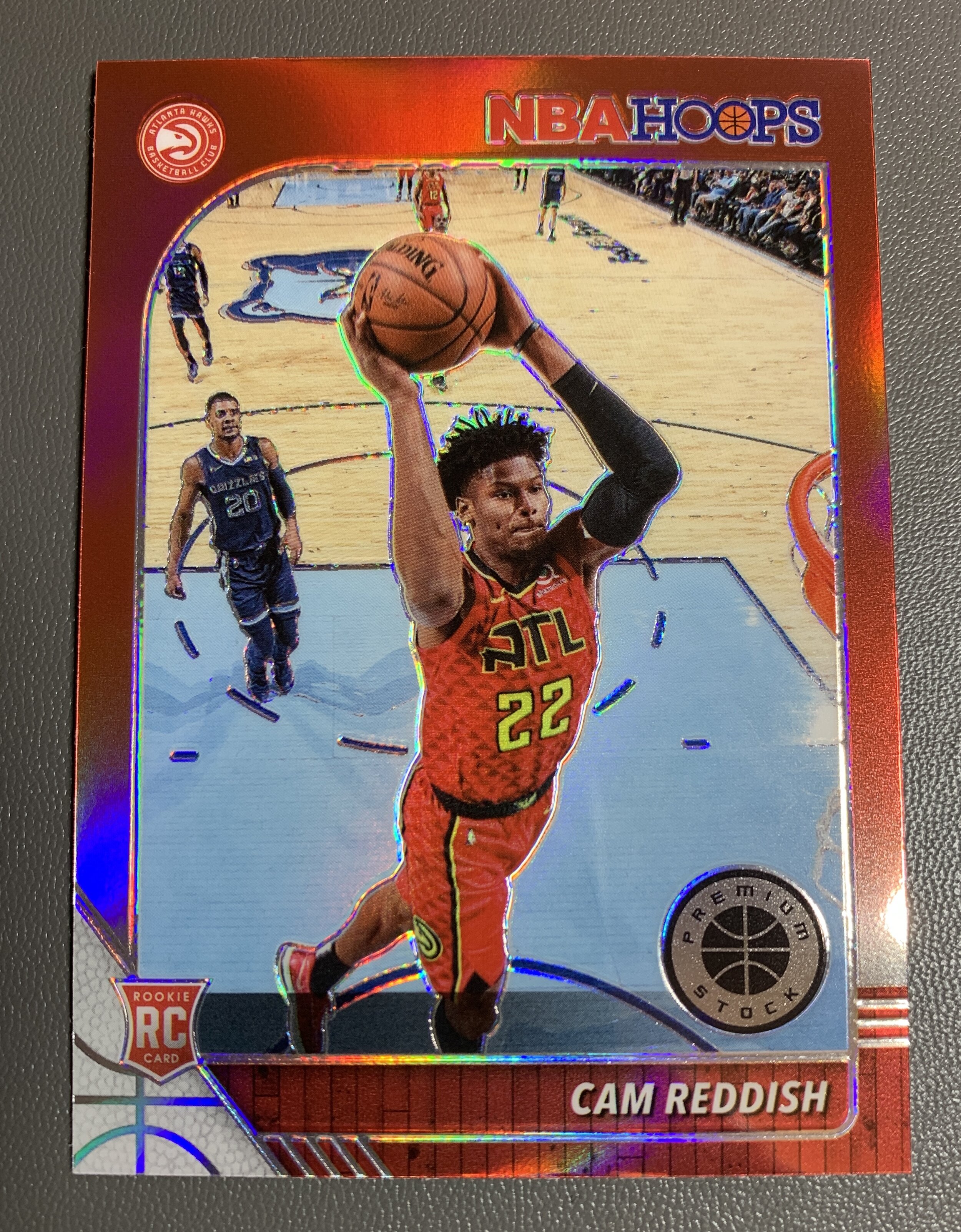 Great jersey color matching Cam Reddish Prizm rookie card with in-game monster slam photo.