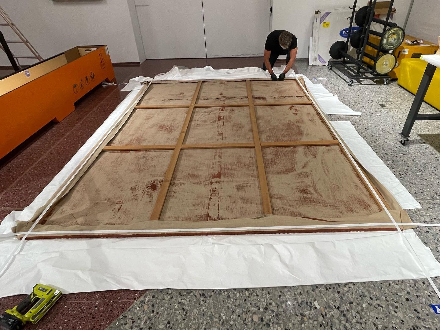 Stretching oversized canvas is our thing! Last week we stretched two works from the NMA collection, both are significant objects in our shared global cultural history. They were both painted in the early 70&rsquo;s in Papunya, where circle and dot pa