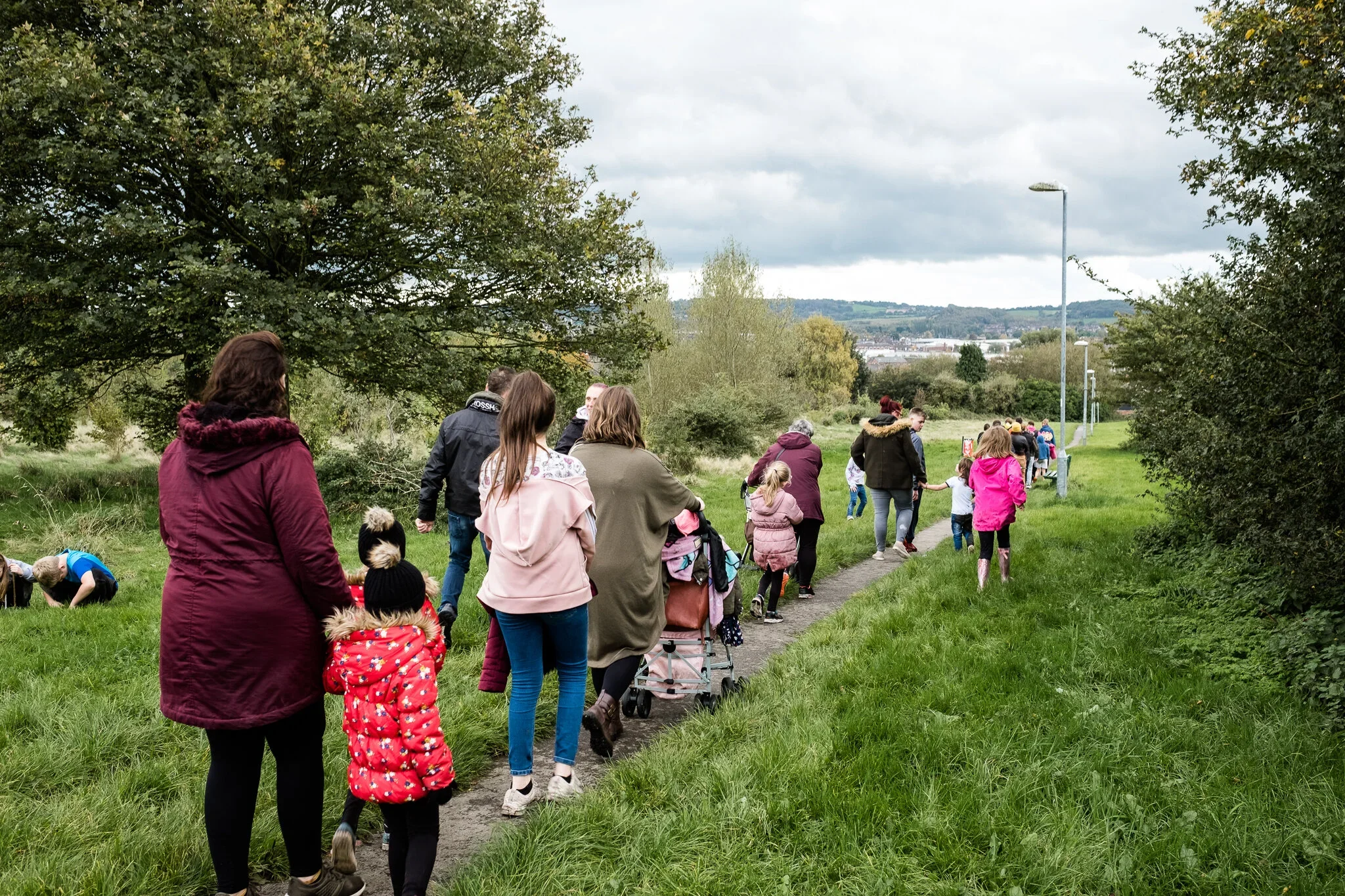 Community walk through East Fenton parkland during a Playing Out session.