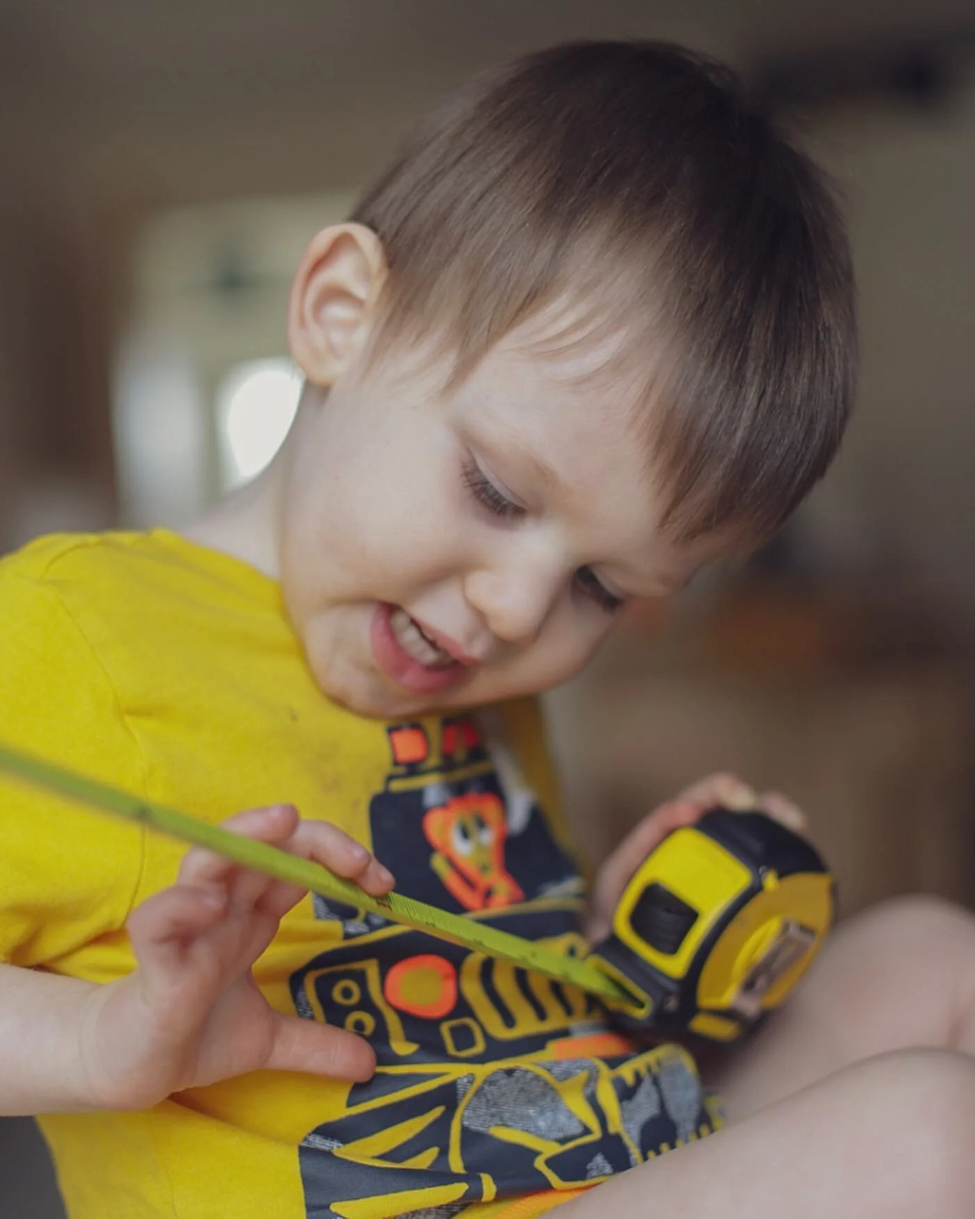 Today&rsquo;s entertainment brought to you by the mighty tape measure! 
This is what I love so much about at home, lifestyle photography - children are so much more relaxed and happy to play with their usual (or unusual!) toys, or to climb all over y