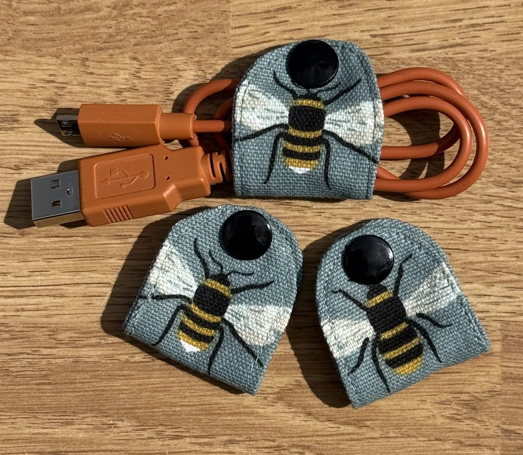 Sophie Allport Bees Teal Cable Tidy