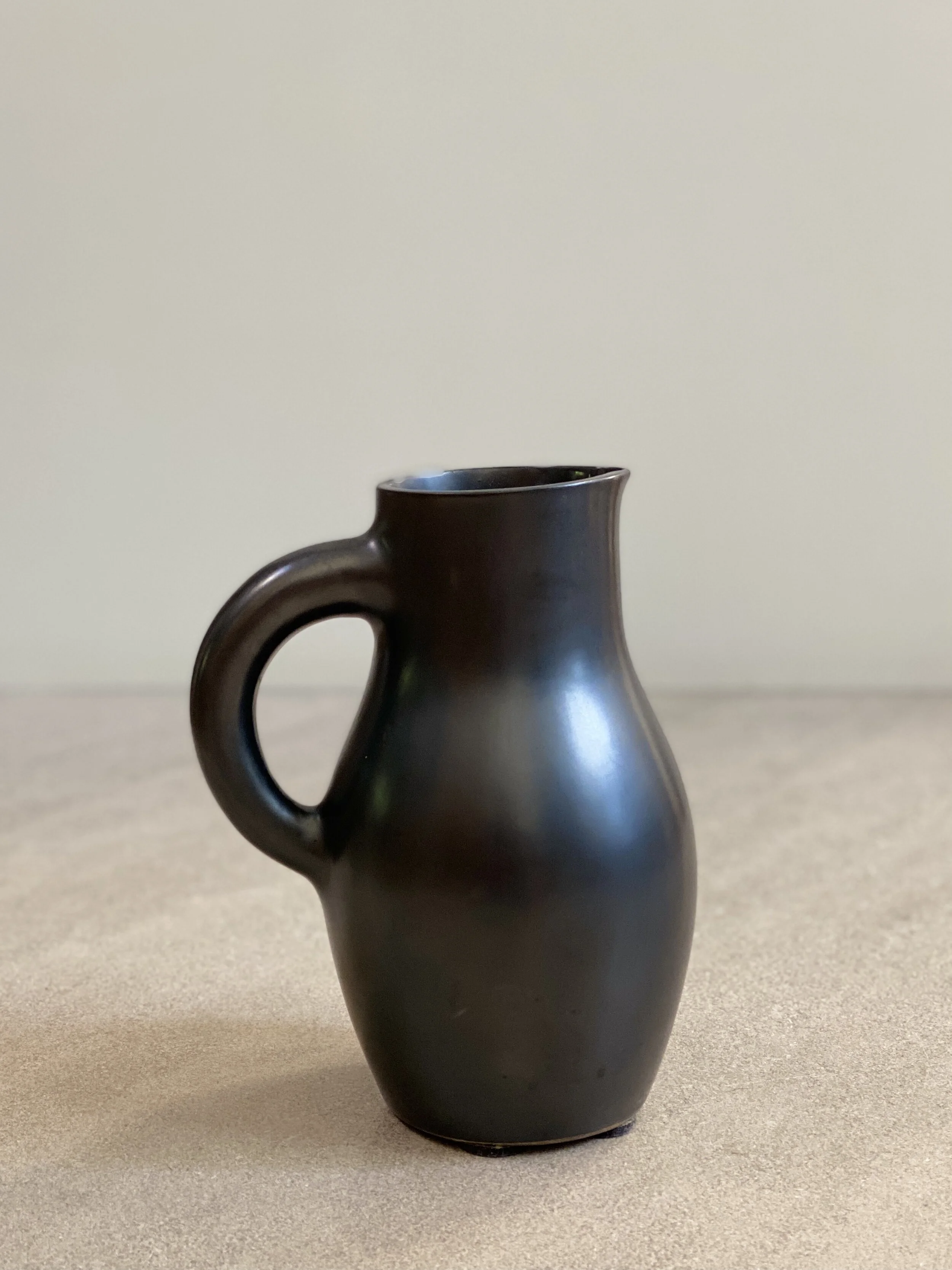 Signed Pitcher by French Ceramicist, Georges Jouve. 7 1/2 inches