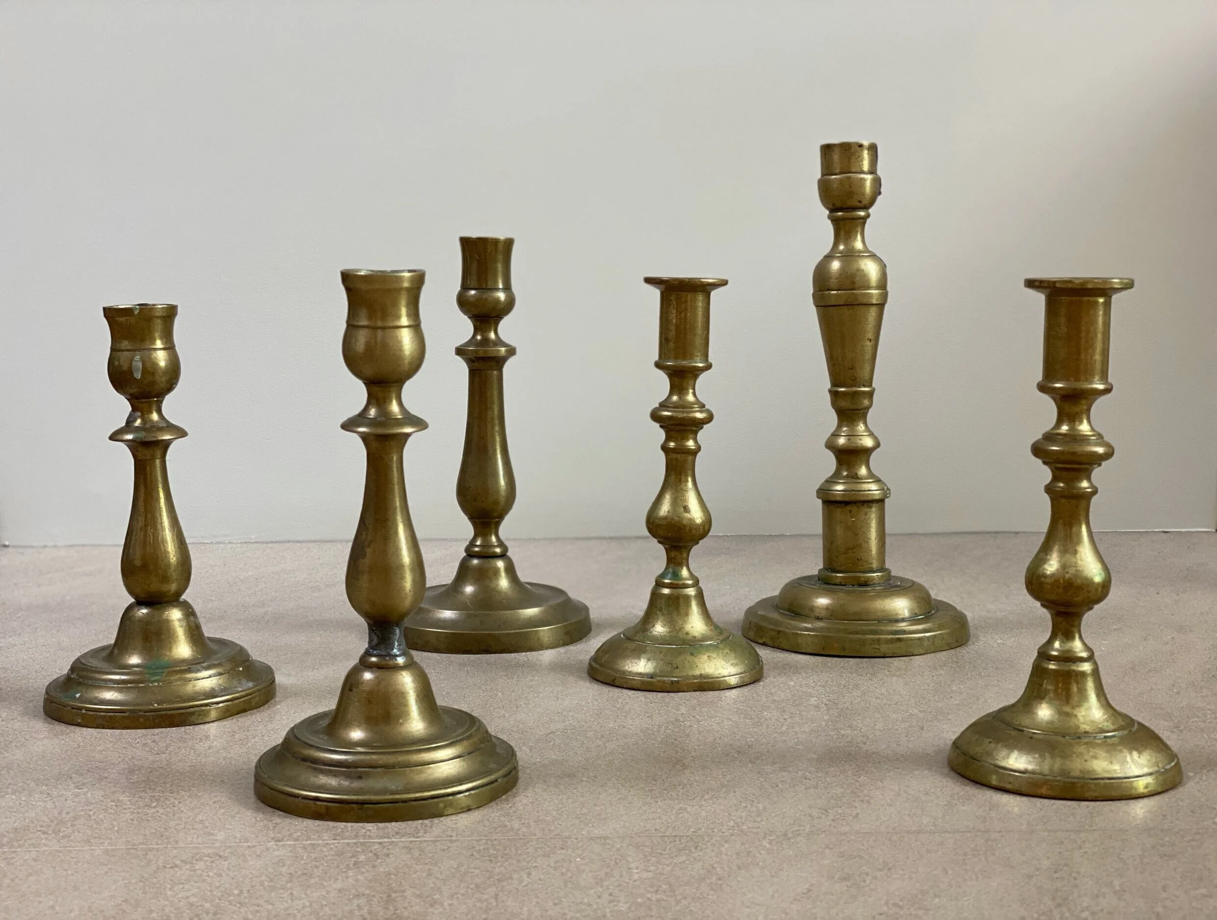 Six 18th and 19th Century Brass Candlesticks from France 7 1/2 -11 inches tall