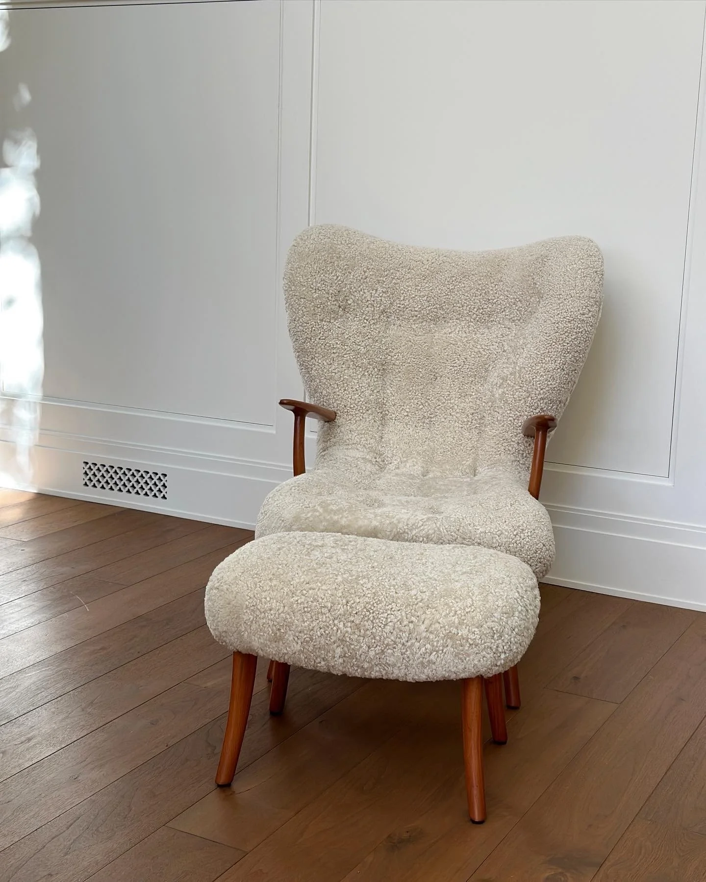 Pragh Chair and Ottoman in Shearling by Madsen and Schubell, Denmark c. 1950 Chair - 40 x 32 x 37 inches deep Ottoman 24 x1 6 x 16 inches