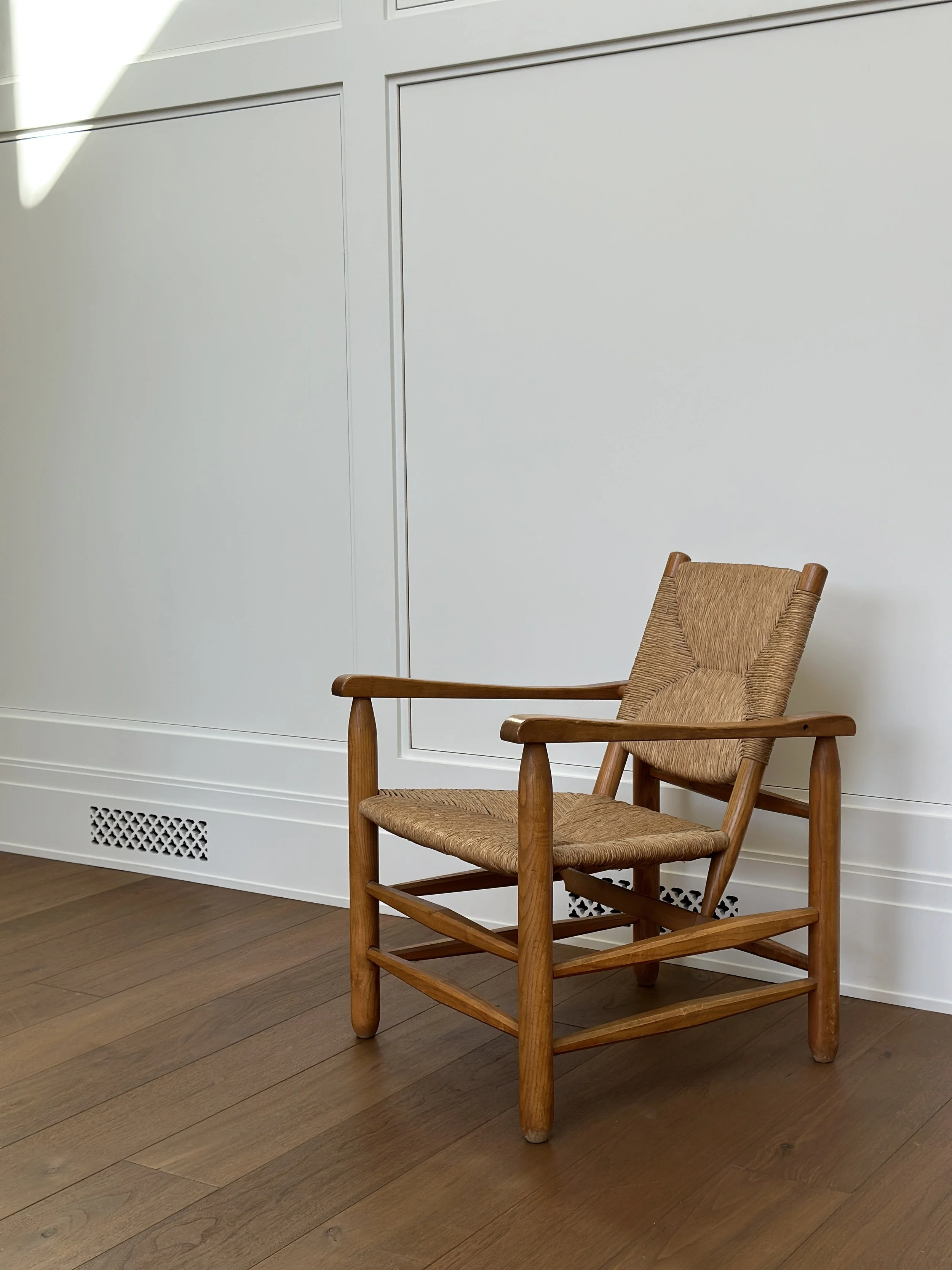Chair in Rush and Oak by Charlotte Perriand, France c. 1950 31 x 22 x 26 inches deep