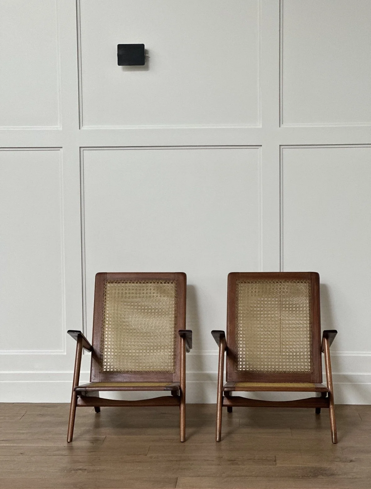 French Easy Chairs in Cane and Oak Wood, c. 1950 31 1/2 x 23 3/4 x 35 inches deep Seat Height 11 1/2 Front and 8 Back