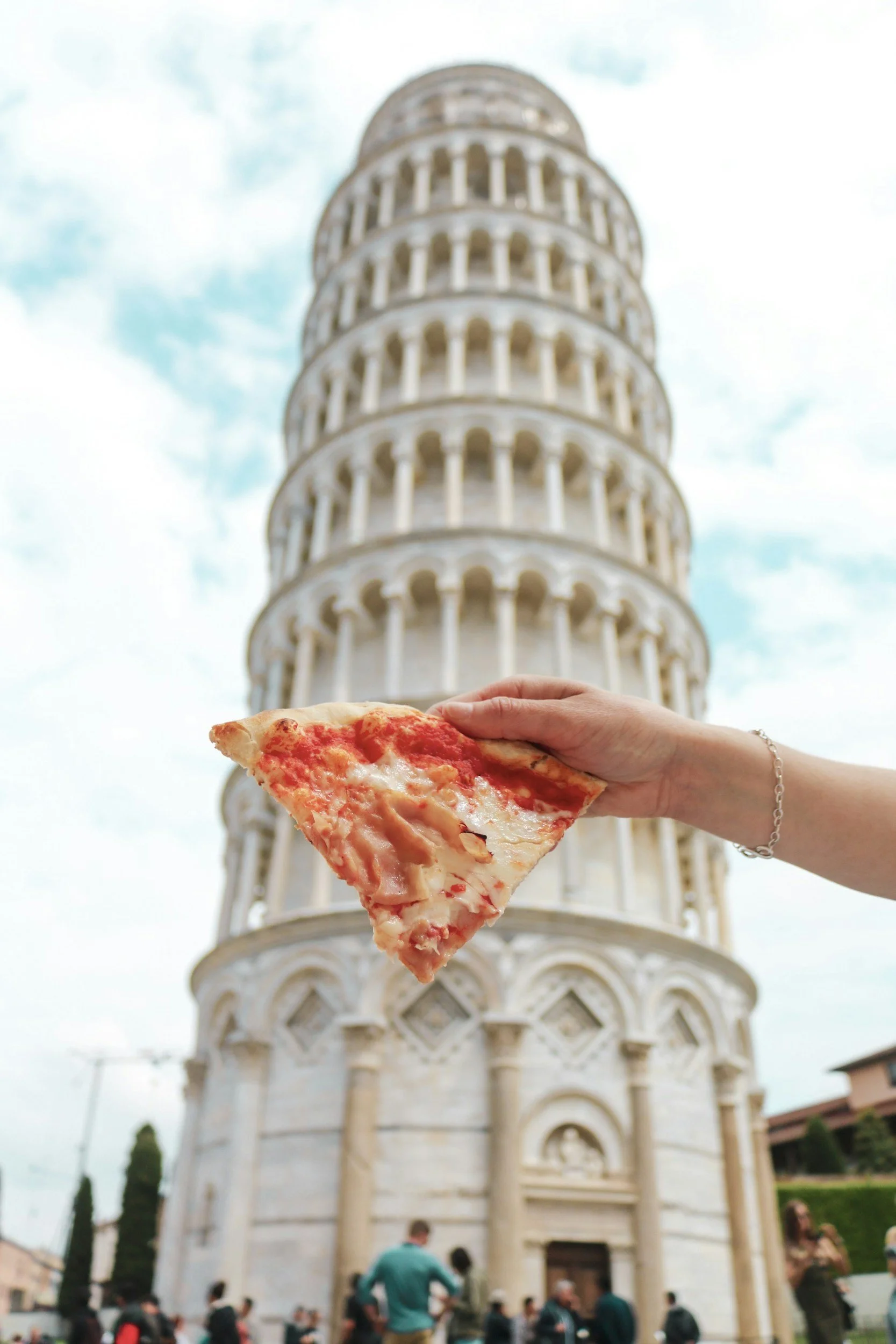 Escorted tour group with guide exploring a historic Italian piazza
