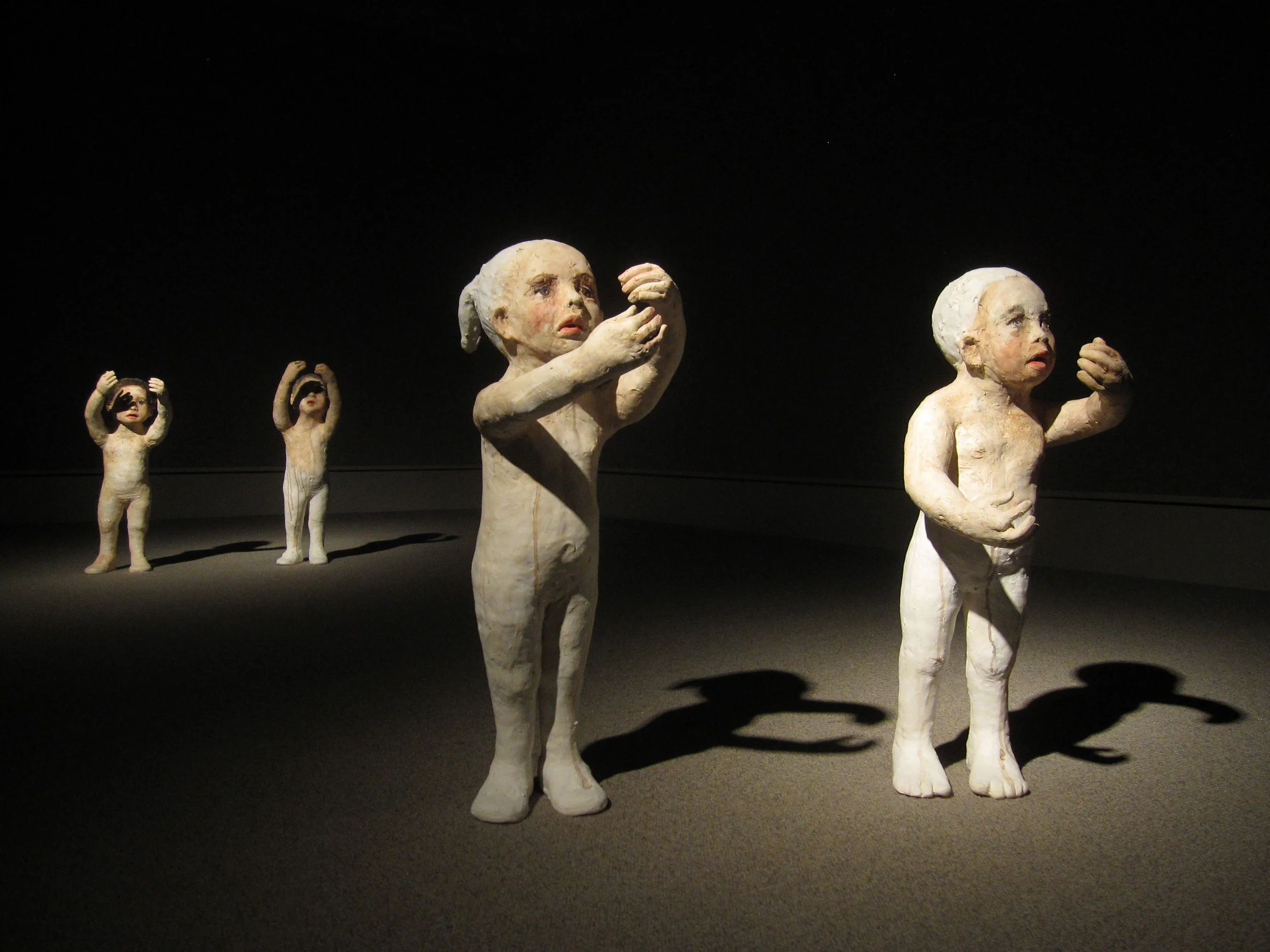Falling, 2011, Painted ceramic, Installation view, Museum of Nebraska Art, Kearney, Nebraska