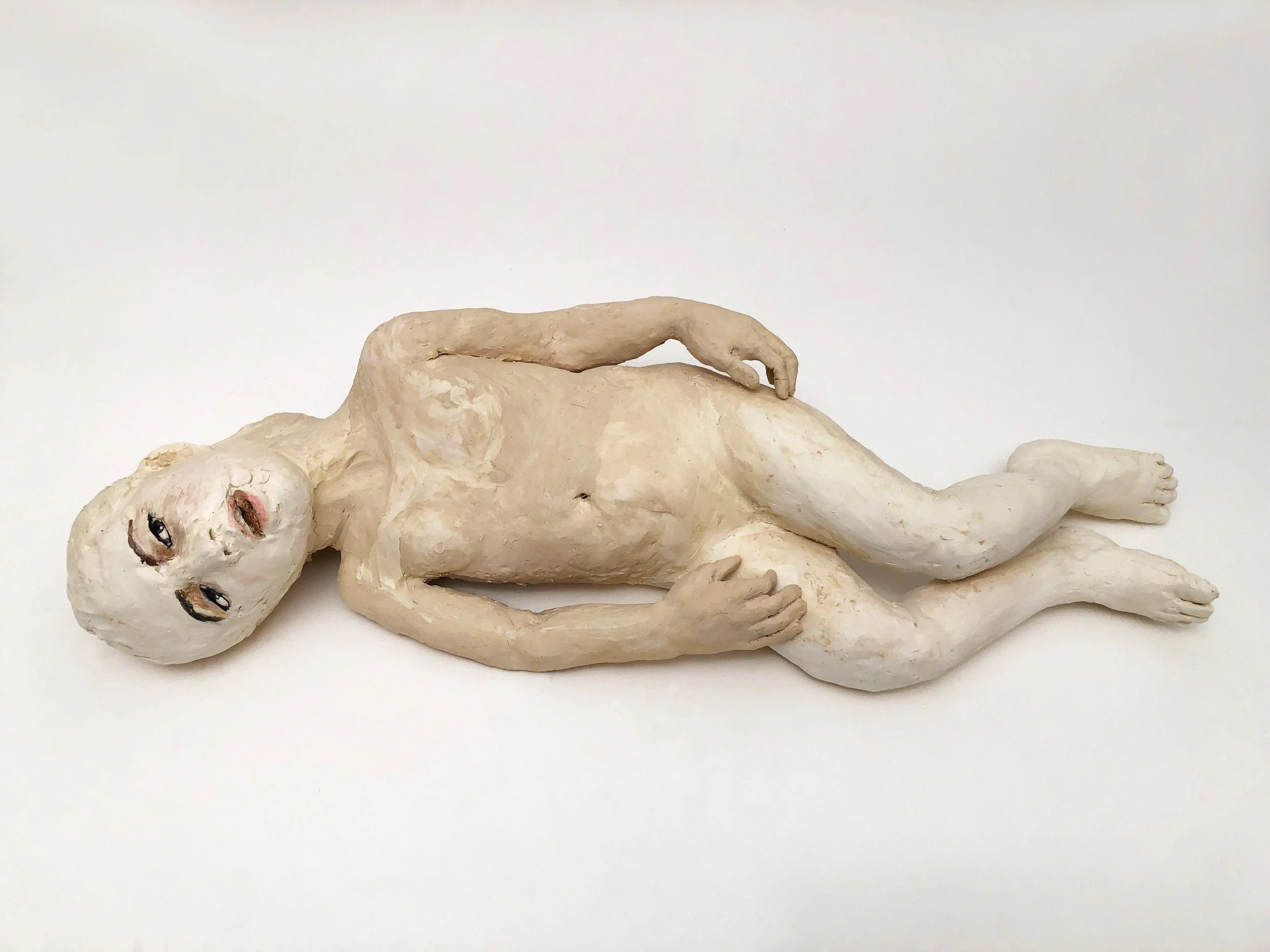 Girl on Ground, 2018, Glazed ceramic, 7 x 13 x 32 in.
